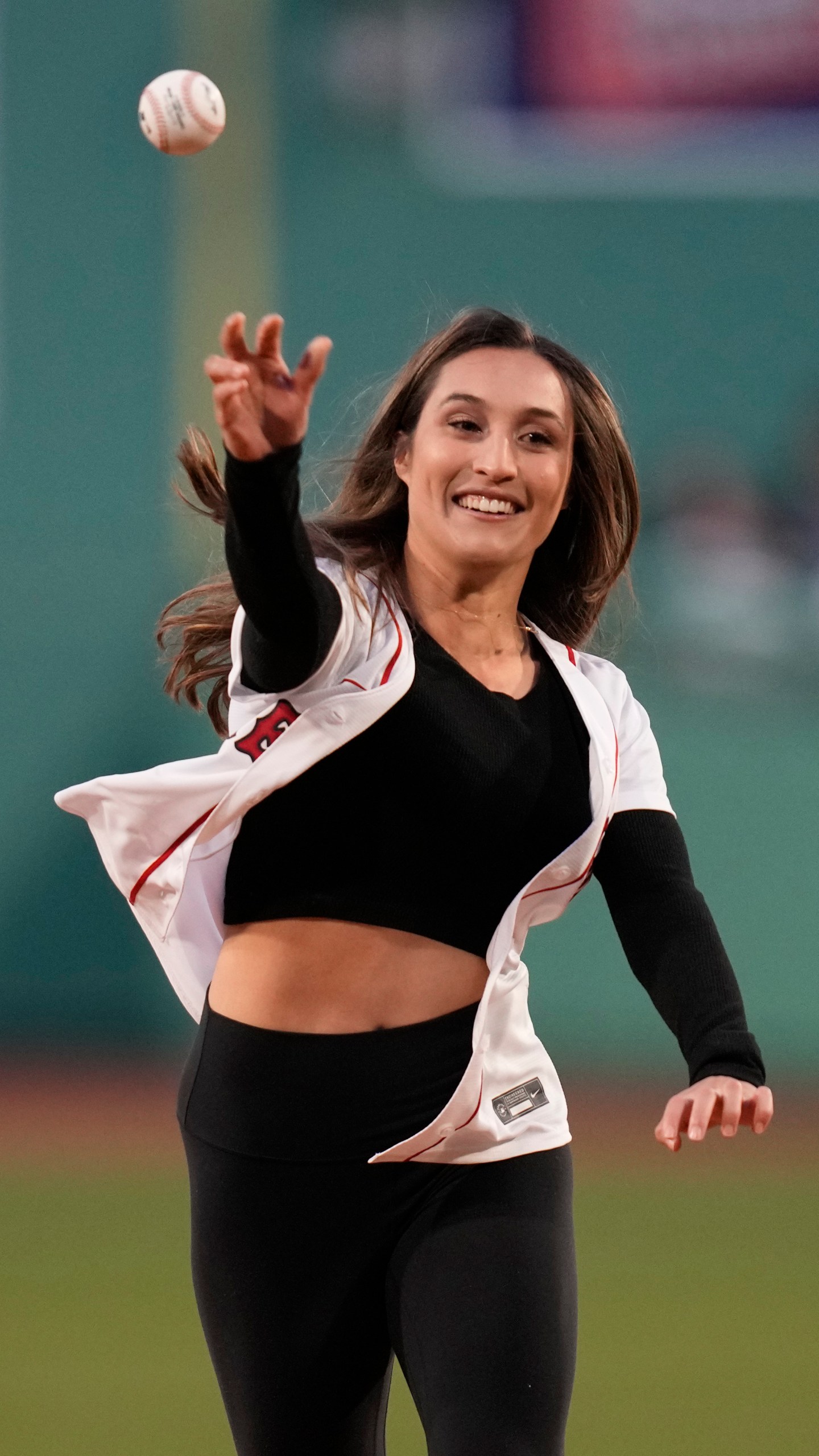 FILE - MIT women's soccer graduate student Karenna Groff throws a ball prior to a baseball game at Fenway Park, Monday, April 3, 2023, in Boston. (AP Photo/Charles Krupa, File)