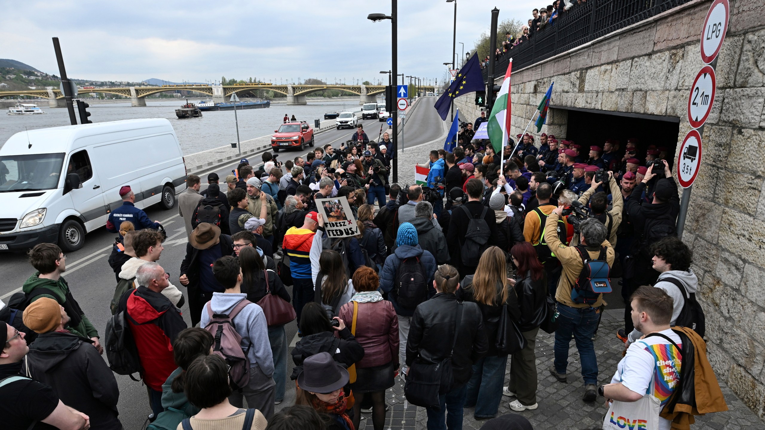 Supporters of the political party Momentum stage a protest in Budapest, Monday, April 14, 2025 after Hungary’s parliament has passed an amendment to the constitution that allows the government to ban public events by LGBTQ+ communities. (Tibor Illyes/MTI via AP)