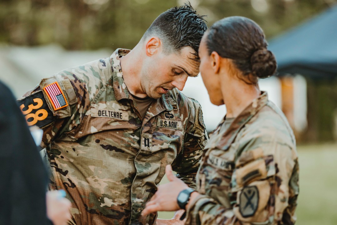 This image provided by the U.S. Army shows Capt. Seth Deltenre, left, and 1st Lt. Gabrielle White, from the Maneuver Center of Excellence in Fort Benning, Ga., as they compete during the Malvesti obstacle course in the 2025 Best Ranger Competition, April 11, 2025, at Camp Rogers in Fort Benning. (Patrick A. Albright/U.S. Army via AP)