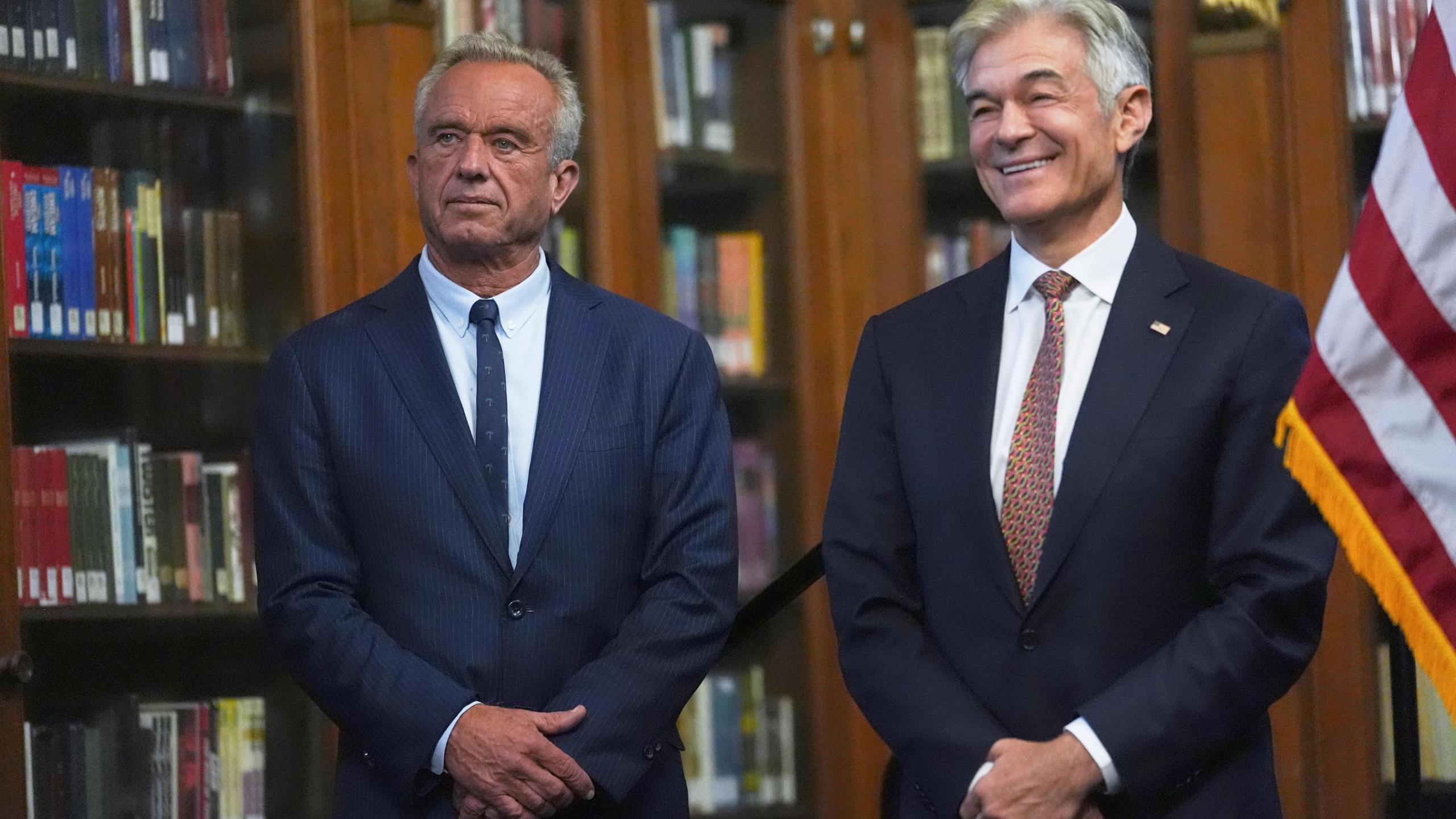 RFK Jr. and Dr. Oz stand together during an event