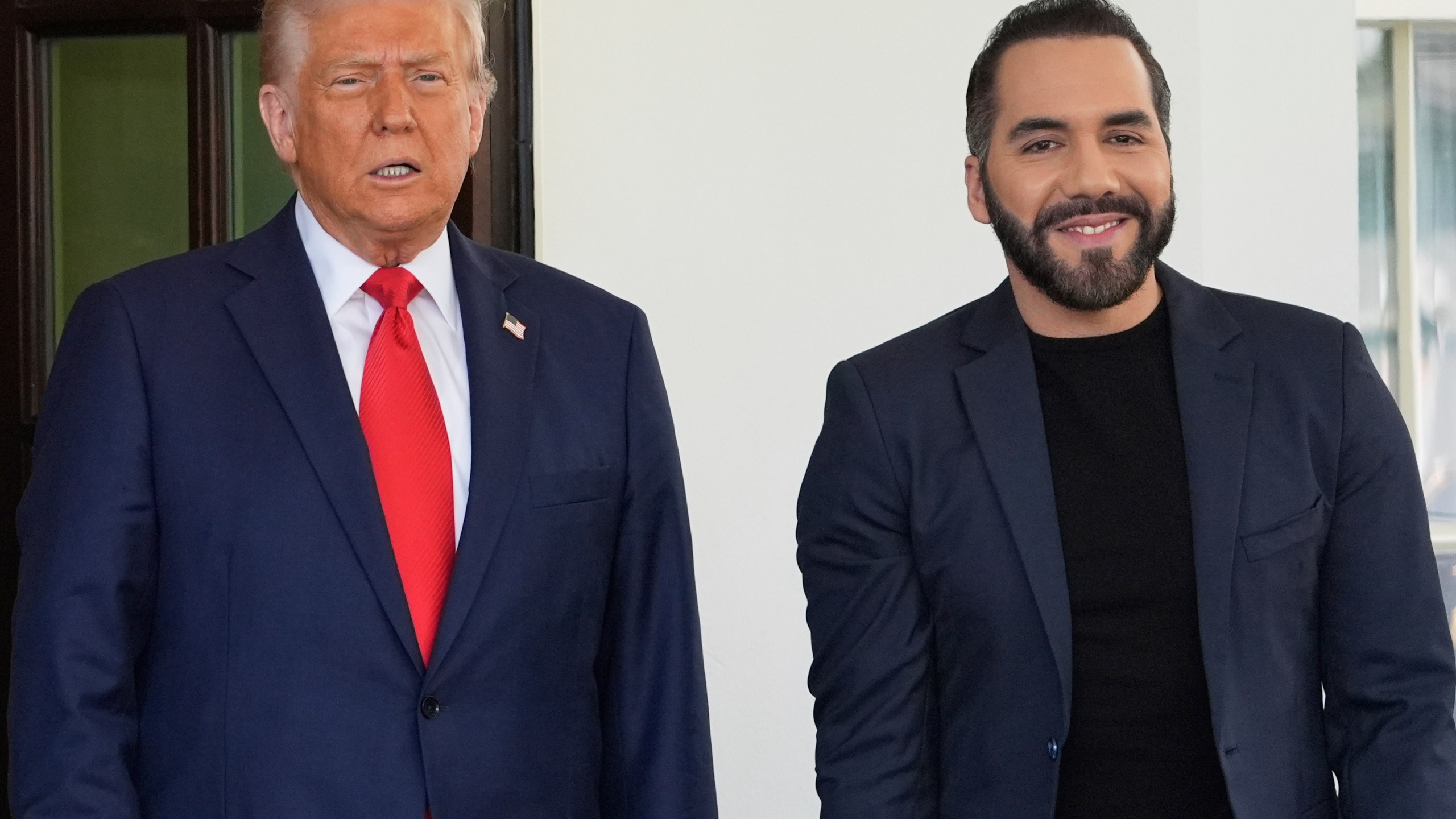 President Donald Trump, left, greets El Salvador's President Nayib Bukele as Bukele arrives at the White House, Monday, April 14, 2025, in Washington. (AP Photo/Manuel Balce Ceneta)