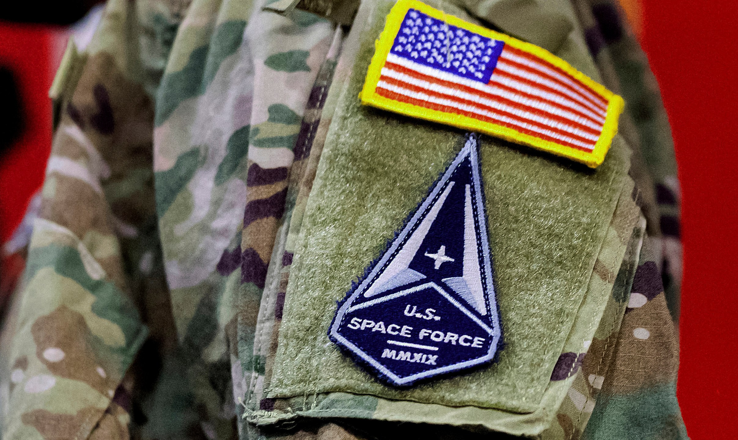 FILE - A solider wears a U.S. Space Force uniform during a ceremony for U.S. Air Force airmen transitioning to U.S. Space Force guardian designations at Travis Air Force Base, Calif., Feb. 12, 2021. (AP Photo/Noah Berger, File)