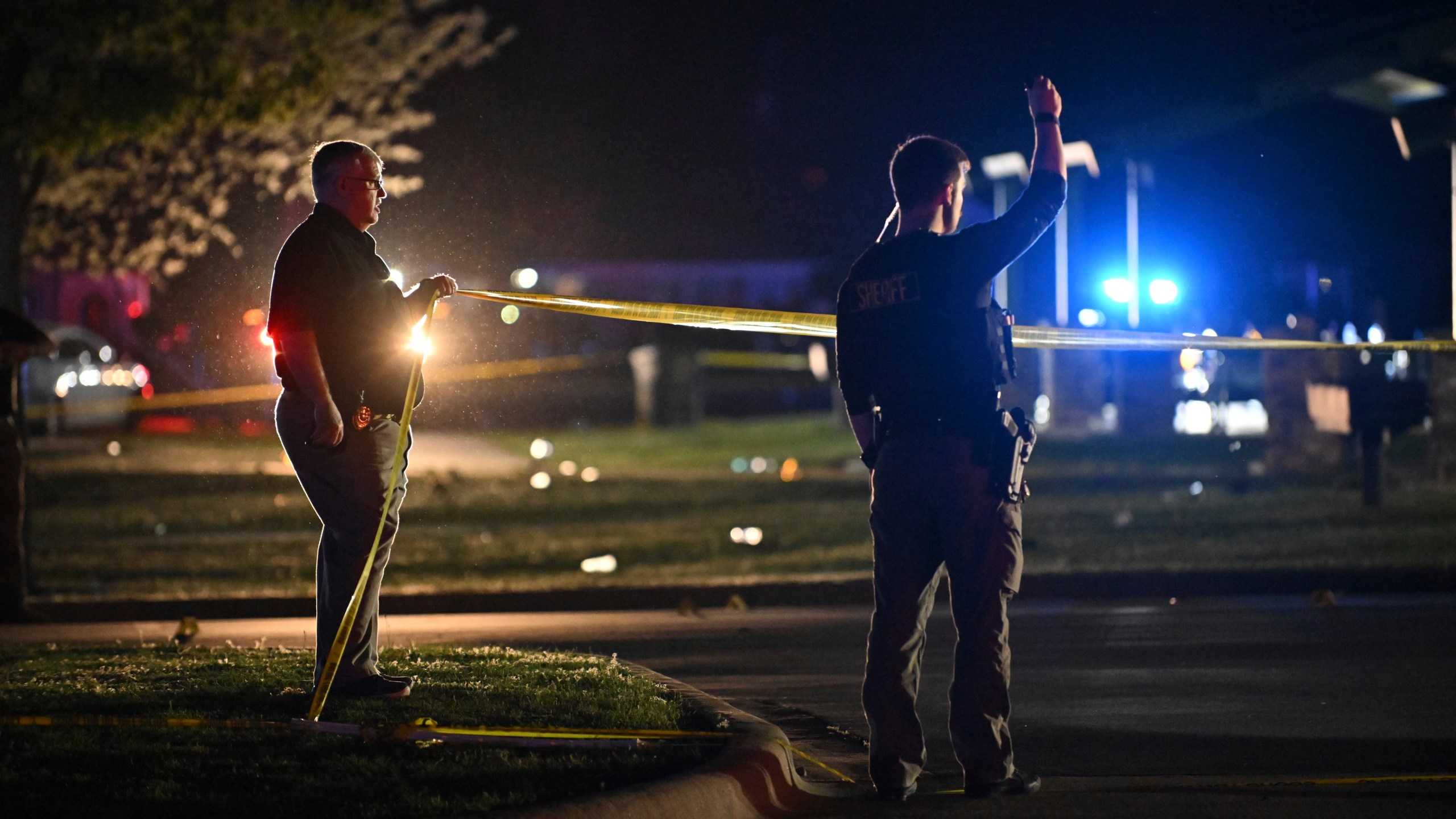 Law enforcement officers work the scene of a shooting Sunday, April 13, 2025 at Fifth Avenue Park in Conway, Ark. (Staci Vandagriff/Arkansas Democrat-Gazette via AP)