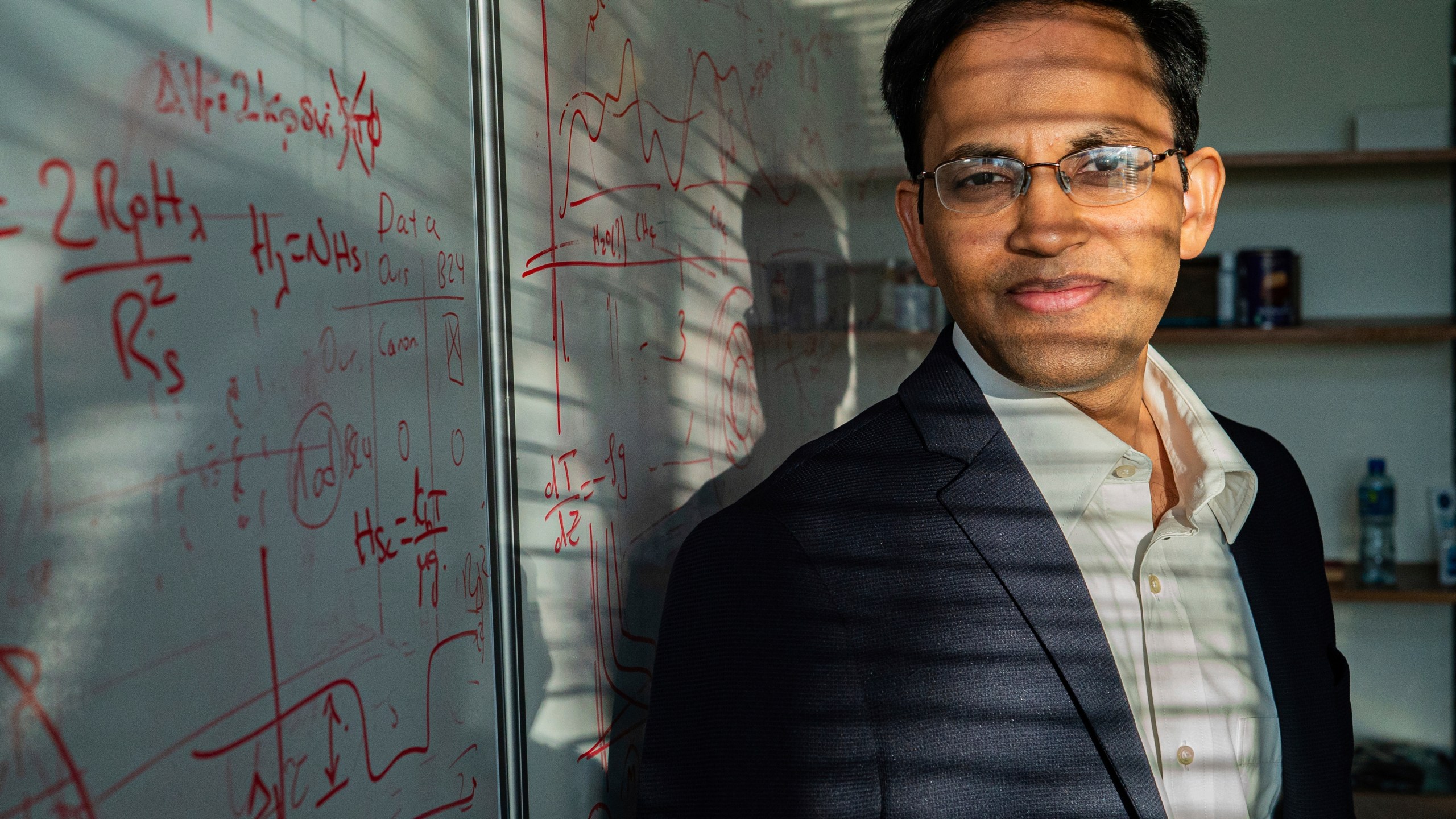 Astrophysicist Nikku Madhusudhan poses for a photo at the Institute of Astronomy at the University of Cambridge, England, April 2025. (Atlantic Studios via AP)