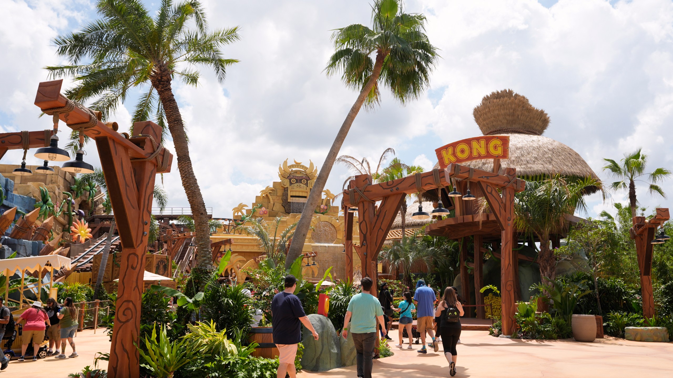 Guests stroll around the various parts of Super Nintendo World at Epic Universe at Universal Resort Orlando Thursday, April 10, 2025, in Orlando, Fla. (AP Photo/John Raoux)