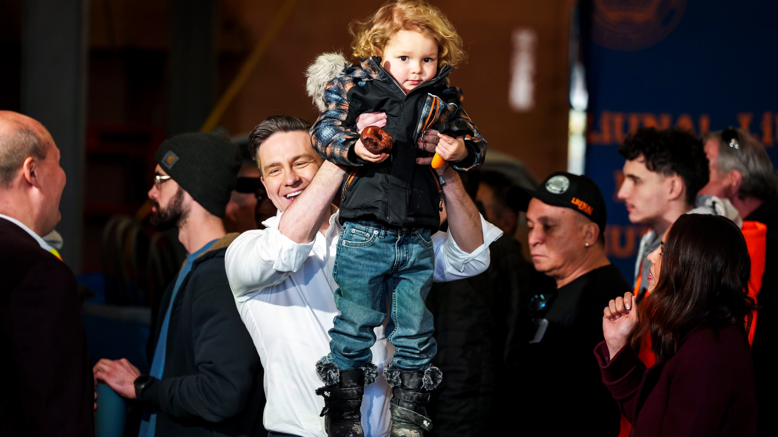 FILE - Conservative Leader Pierre Poilievre lifts his son Cruz up after speaking at a pre-election event in Ottawa, on March 21, 2025. (Justin Tang /The Canadian Press via AP, File)