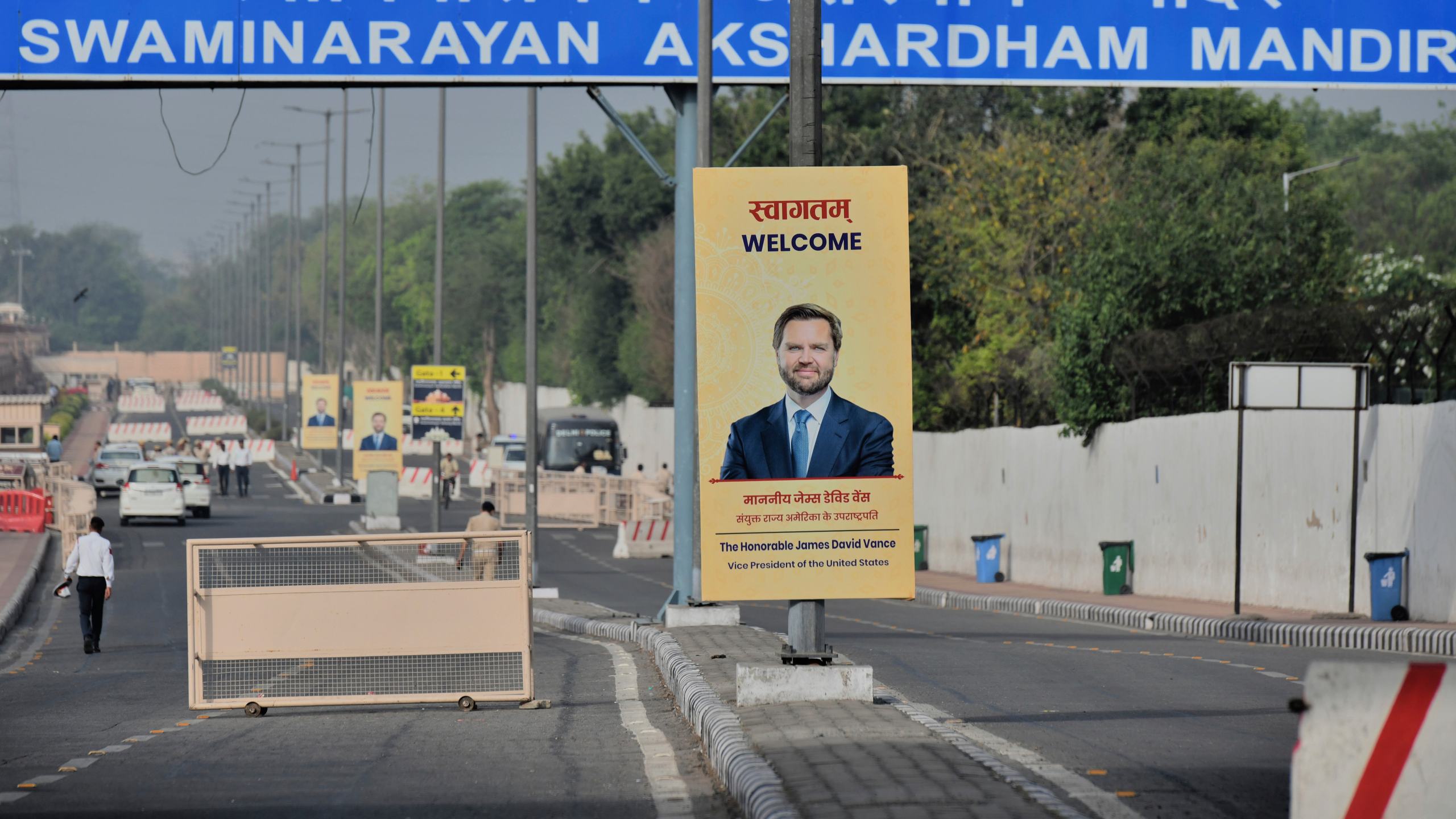 A banner welcoming U.S. Vice President JD Vance is tied to an electric pole on a street in New Delhi, India, Monday, April 21, 2025. (AP Photo)