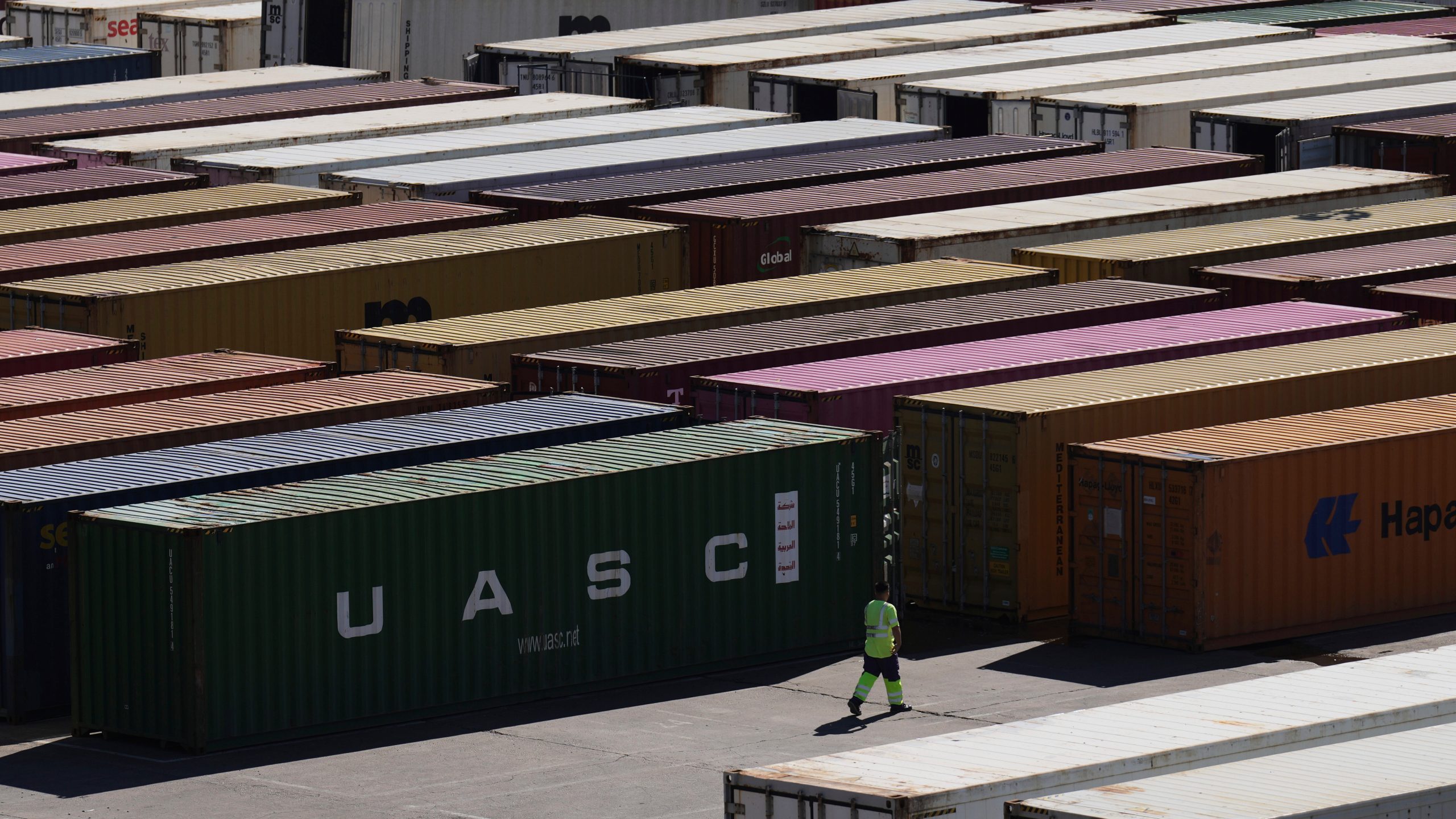 Cargo containers sit at the port in Buenos Aires, Argentina, Monday, April 14, 2025. (AP Photo/Natacha Pisarenko)