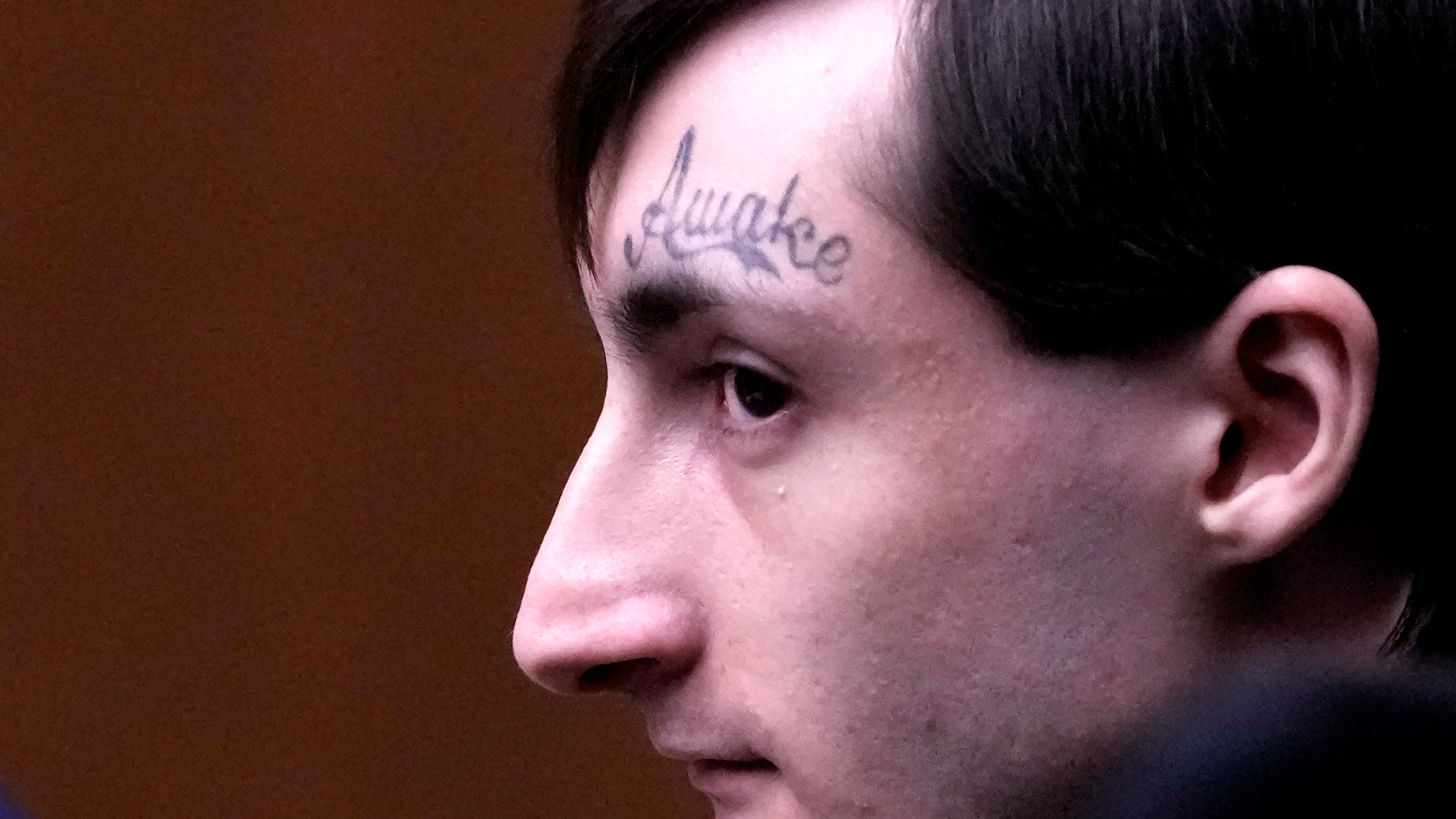 Robert E. Crimo III watches the jury selection process