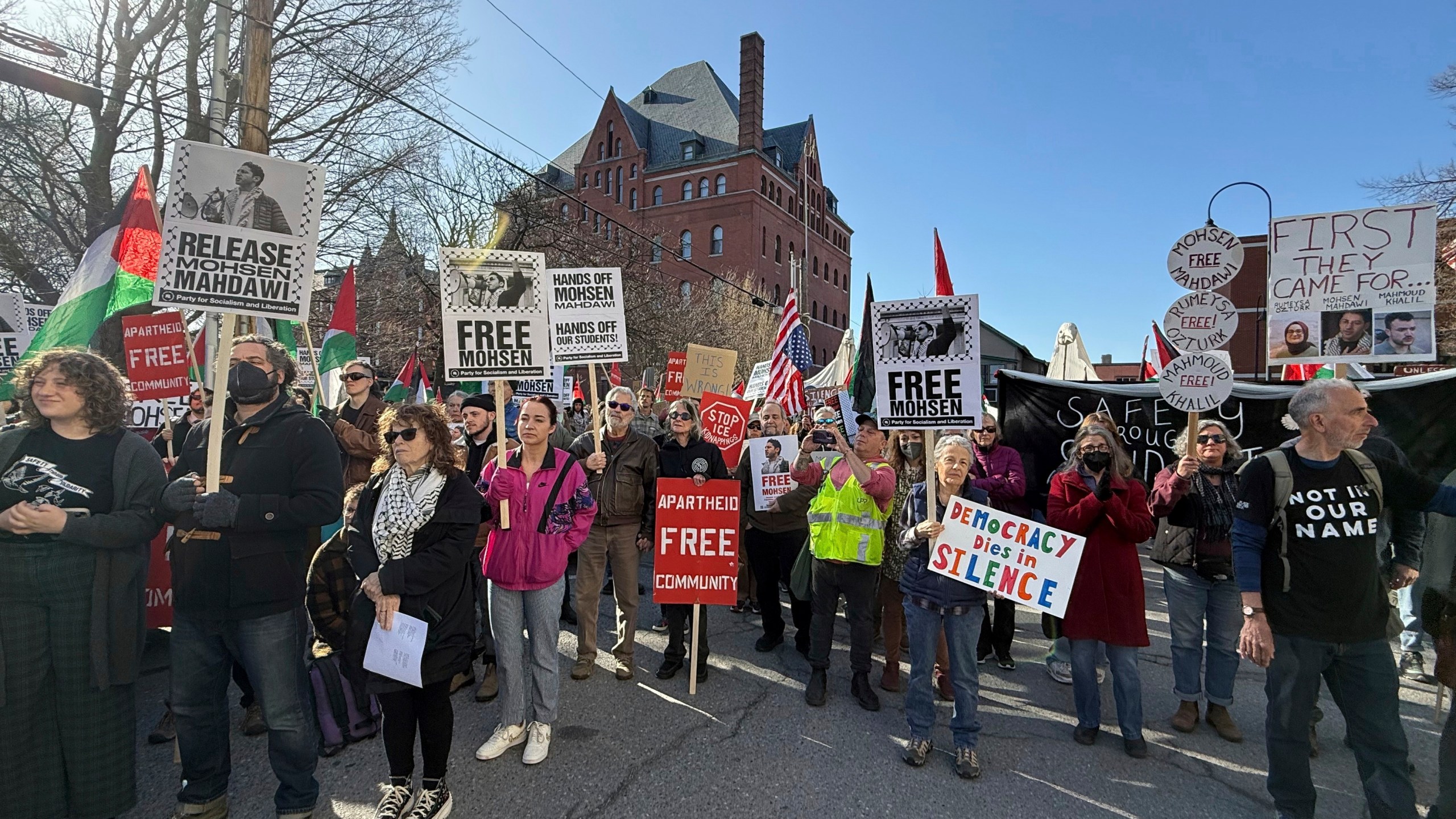 Protesters gather outside federal court ahead of a hearing for Mohsen Mahdawi, a Palestinian man arrested at a Vermont immigration office during an interview about finalizing his U.S. citizenship and a legal permanent resident who led protests against the war in Gaza at Columbia University, Wednesday, April 23, 2025 in Burlington, Vt. (AP Photo/Amanda Swinhart)