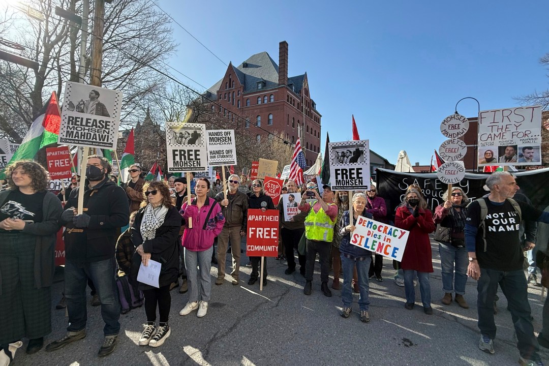 Protesters gather outside federal court ahead of a hearing for Mohsen Mahdawi, a Palestinian man arrested at a Vermont immigration office during an interview about finalizing his U.S. citizenship and a legal permanent resident who led protests against the war in Gaza at Columbia University, Wednesday, April 23, 2025 in Burlington, Vt. (AP Photo/Amanda Swinhart)