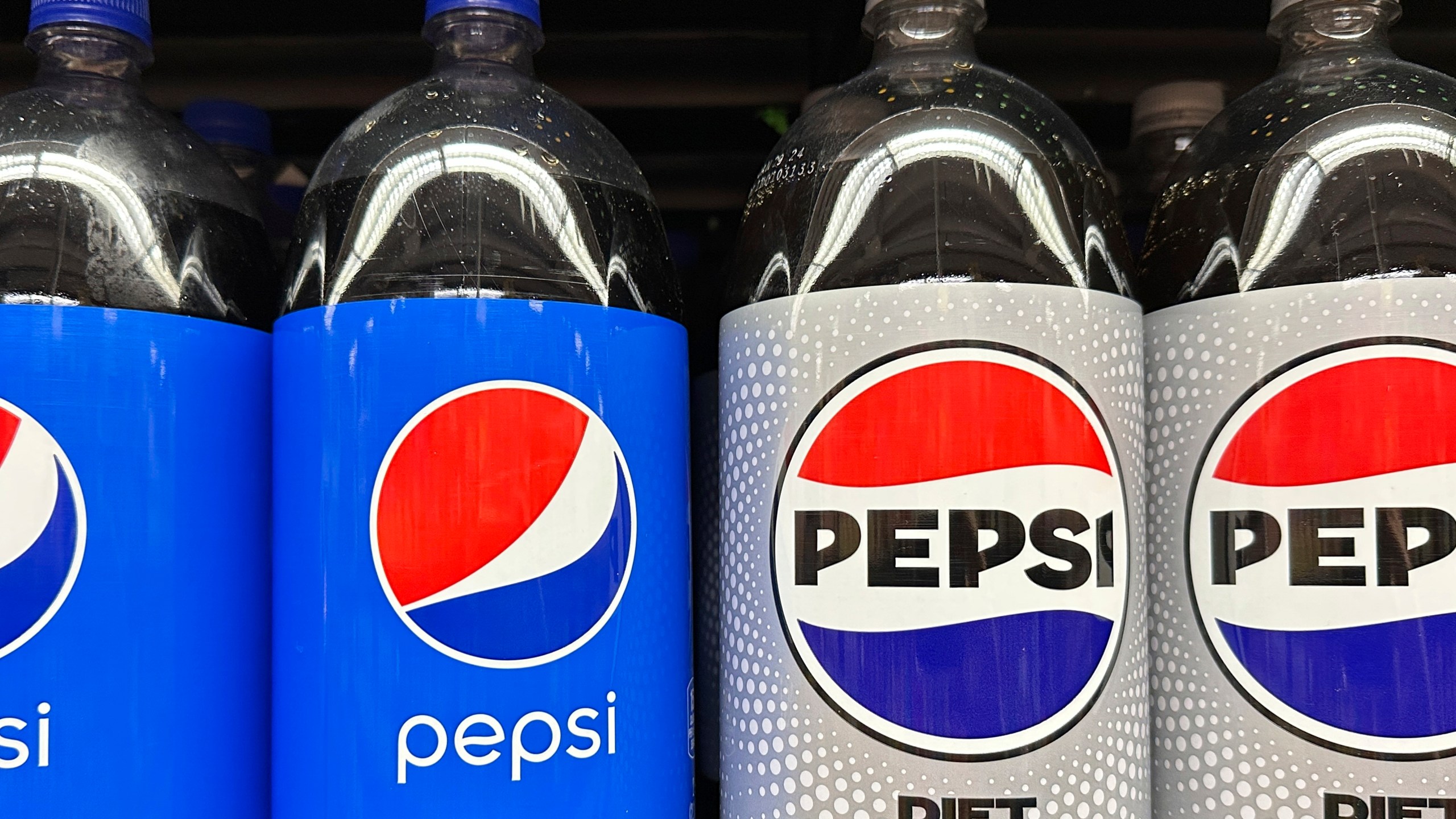 FILE - Plastic bottles of Pepsi are displayed at a grocery store in New York on Nov. 15, 2023. (AP Photo/Ted Shaffrey, File)