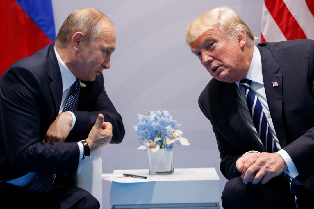 FILE - President Donald Trump, right, meets with Russian President Vladimir Putin at the G-20 Summit in Hamburg, July 7, 2017. (AP Photo/Evan Vucci, File)