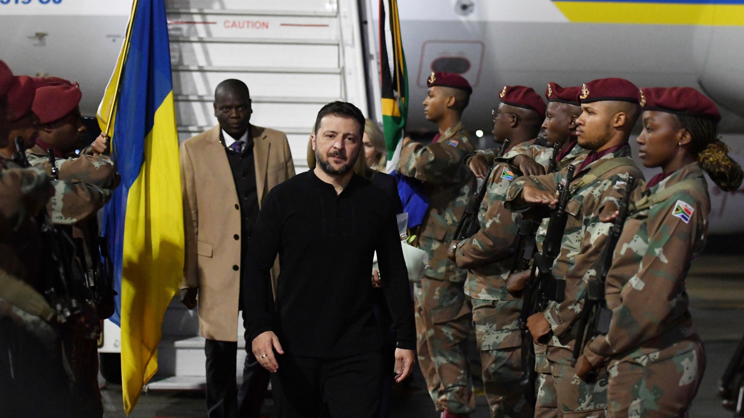 In this photo released by South African Government Communications and Information Services (GCIS), Ukrainian President Volodymyr Zelenskyy arrives in Pretoria, South Africa, for a state visit where he will meet South Africa's President Cyril Ramaphosa, Thursday, April 24, 2025. (AP Photo/GCIS via AP)