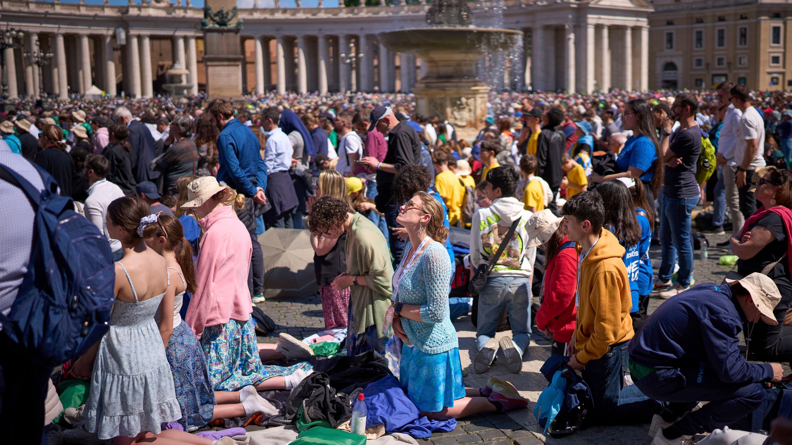 Faithful pray during the funeral of Pope Francis in St. Peter's Square at the Vatican, Saturday, April 26, 2025. (AP Photo/Emilio Morenatti)