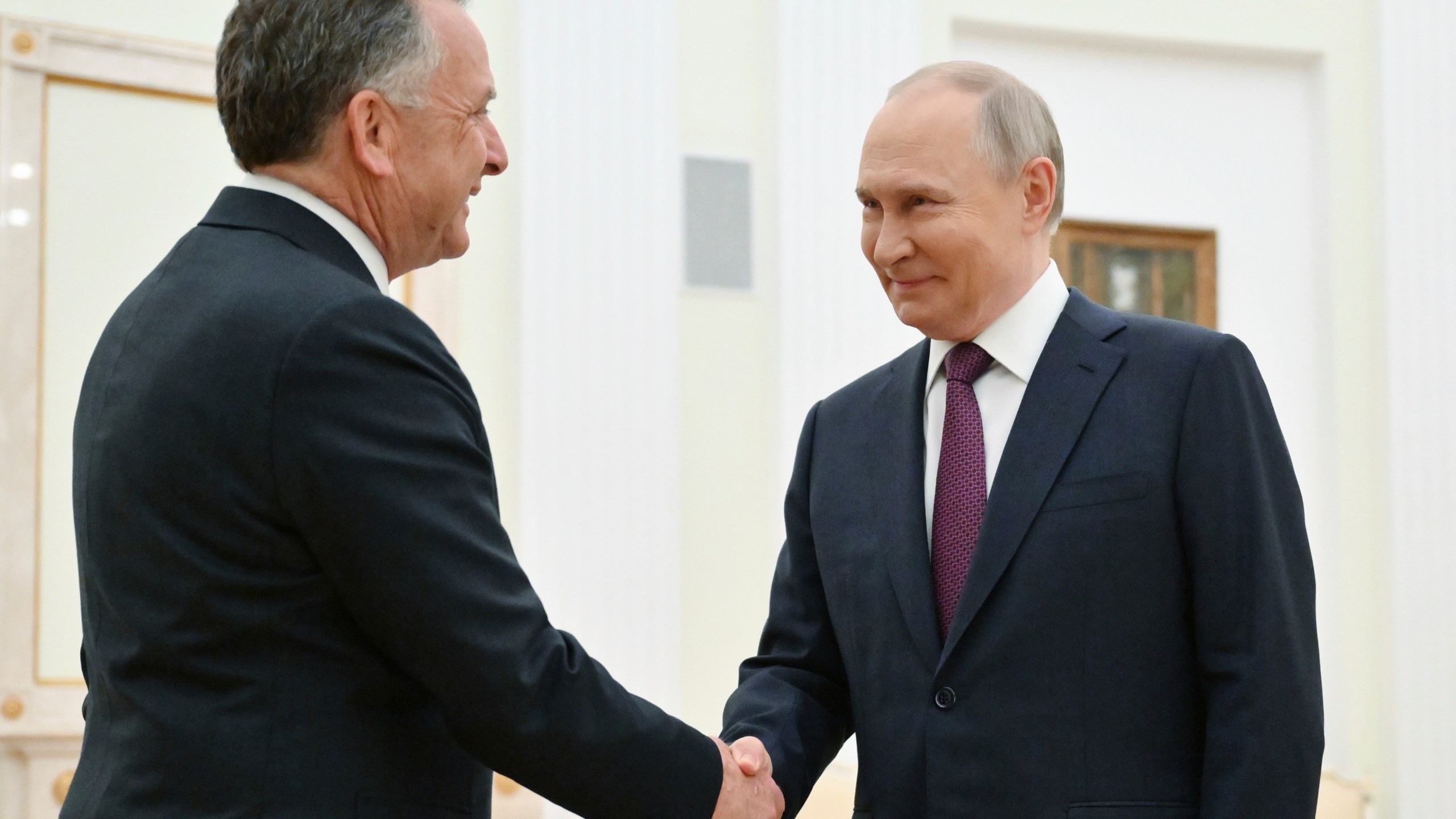 Russian President Vladimir Putin, right, and U.S. President Donald Trump's special envoy Steve Witkoff greet each other prior to their talks at the Kremlin in Moscow, Russia, Friday, April 25, 2025. (Kristina Kormilitsyna, Sputnik, Kremlin Pool Photo via AP)
