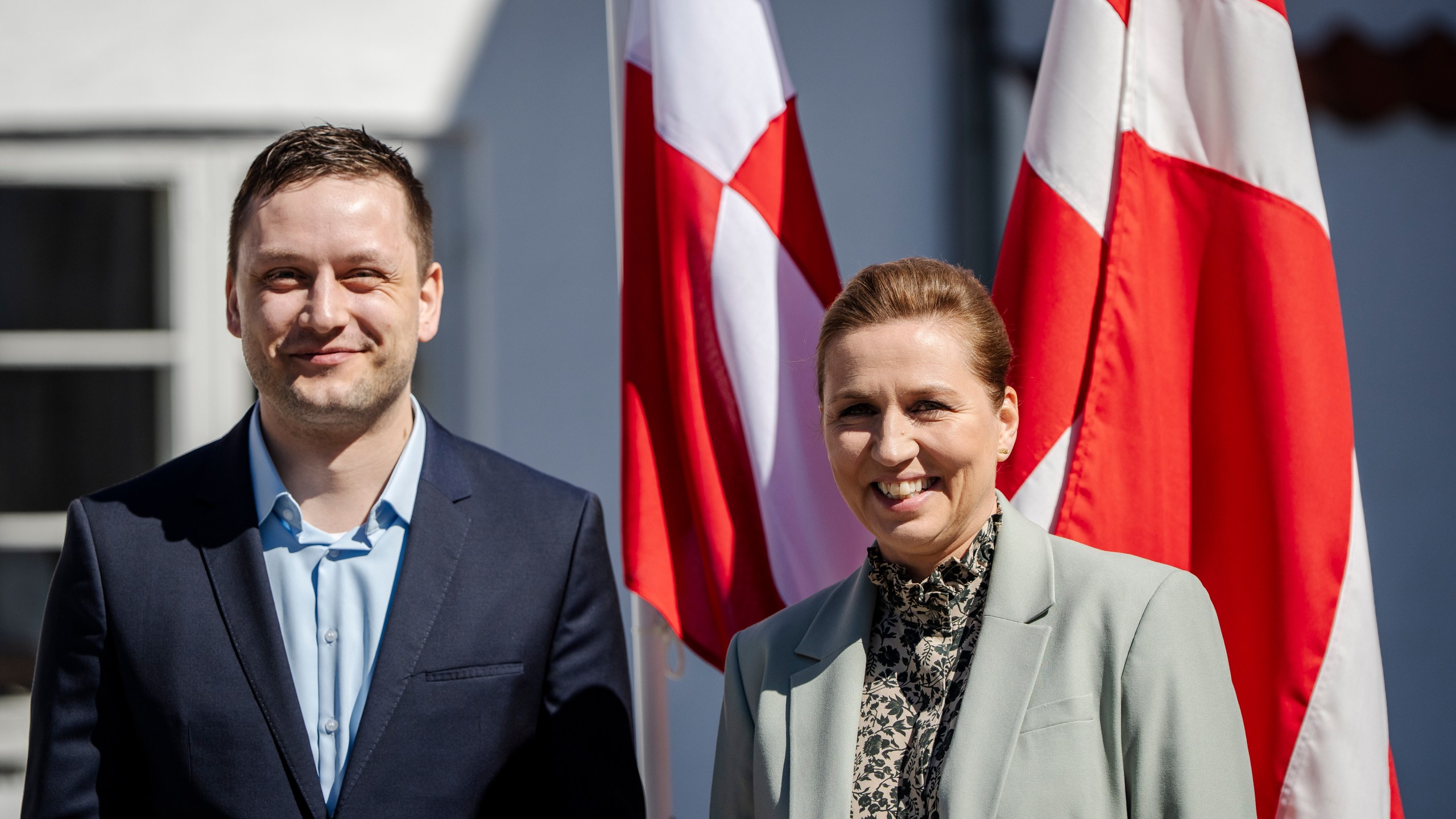 Denmark's Prime Minister Mette Frederiksen, right, and Greenland's Prime Minister Jens-Frederik Nielsen smile during their meeting at Marienborg in Kongens Lyngby, Denmark, Sunday, April 27, 2025. (Mads Claus Rasmussen/Ritzau Scanpix via AP)
