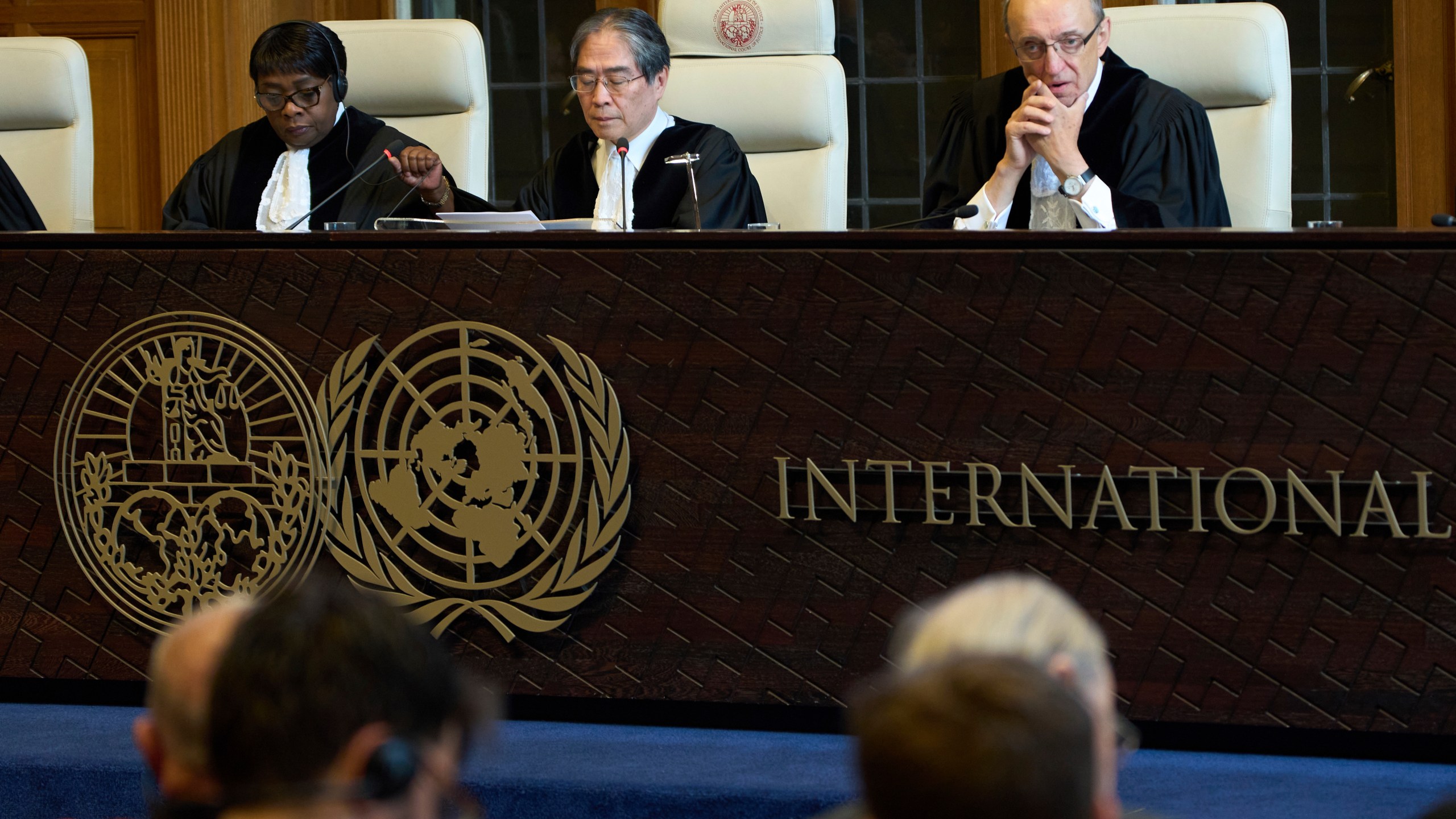 Presiding judge Yuji Iwasawa opens the International Court of Justice hearings into a United Nations request for an advisory opinion on Israel's obligations to allow humanitarian assistance in Gaza and the West Bank, in The Hague, Netherlands, Monday, April 28, 2025. (AP Photo/Peter Dejong)