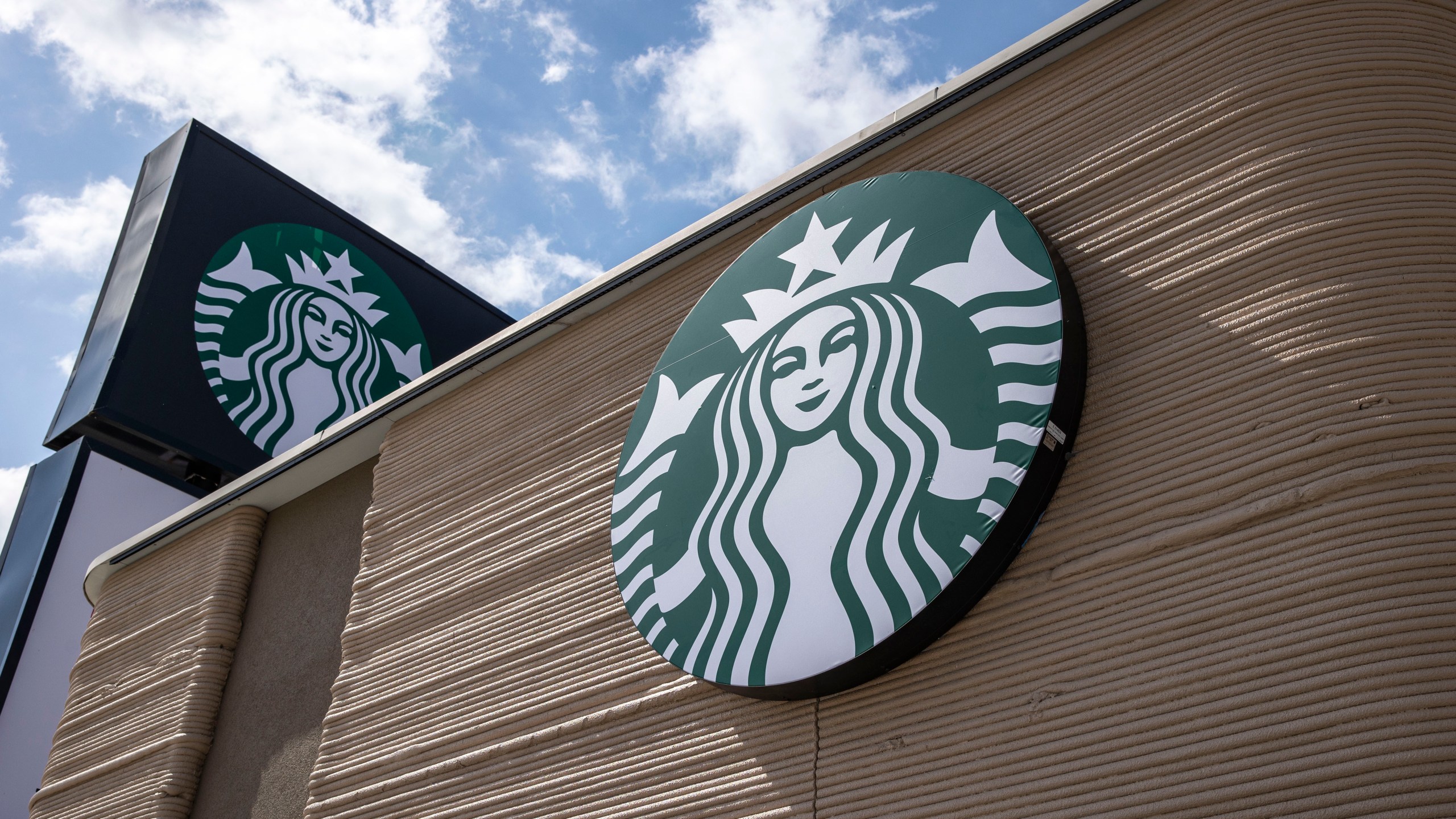 A view of the exterior shows a 3D printed Starbucks building Monday, April 28, 2025, in Brownsville, Texas. (AP Photo/Michael Gonzalez)