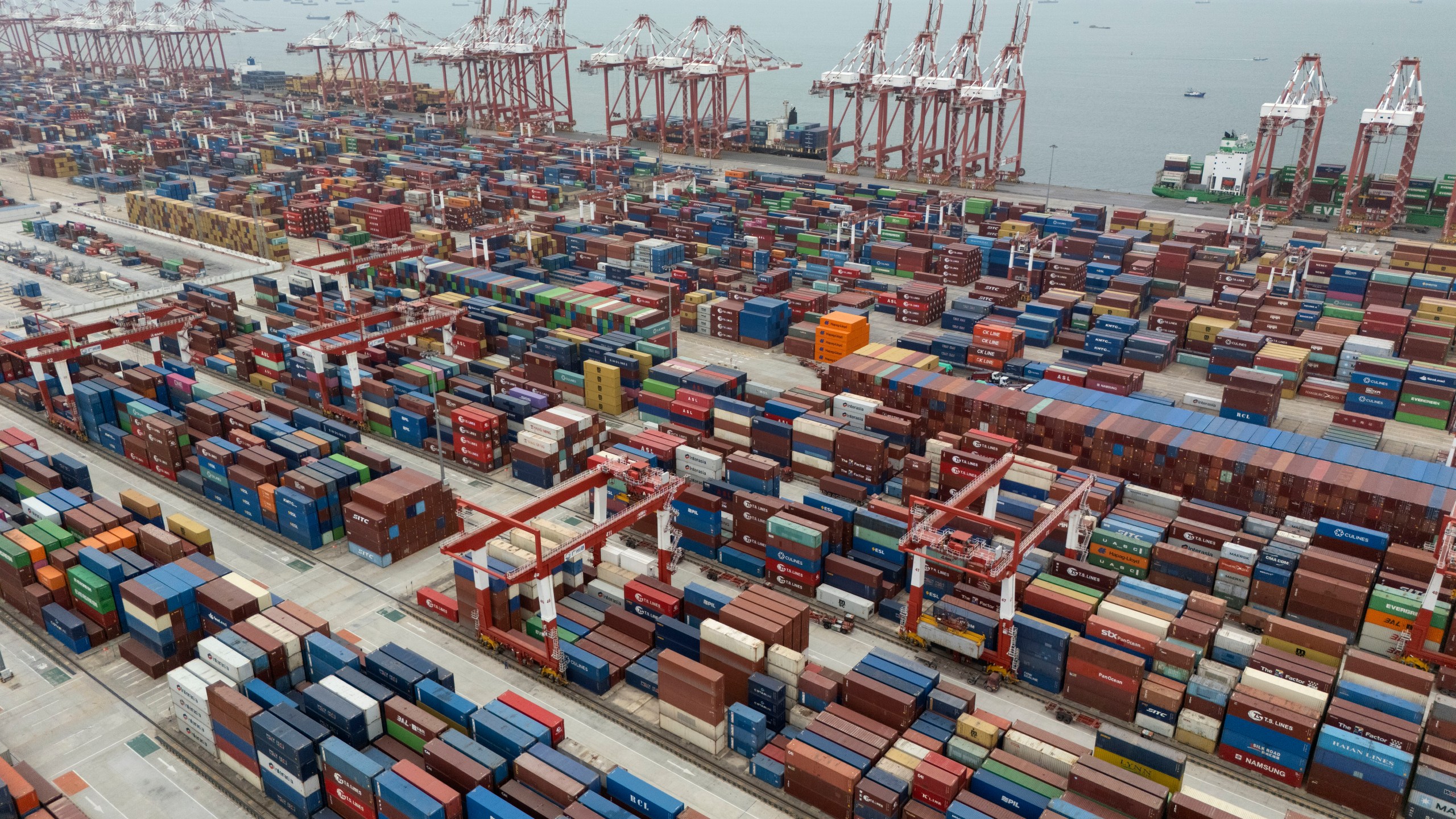 FILE - Shipping containers are seen ready for transport at the Guangzhou Port in the Nansha district in southern China's Guangdong province, April 17, 2025. (AP Photo/Ng Han Guan, File)