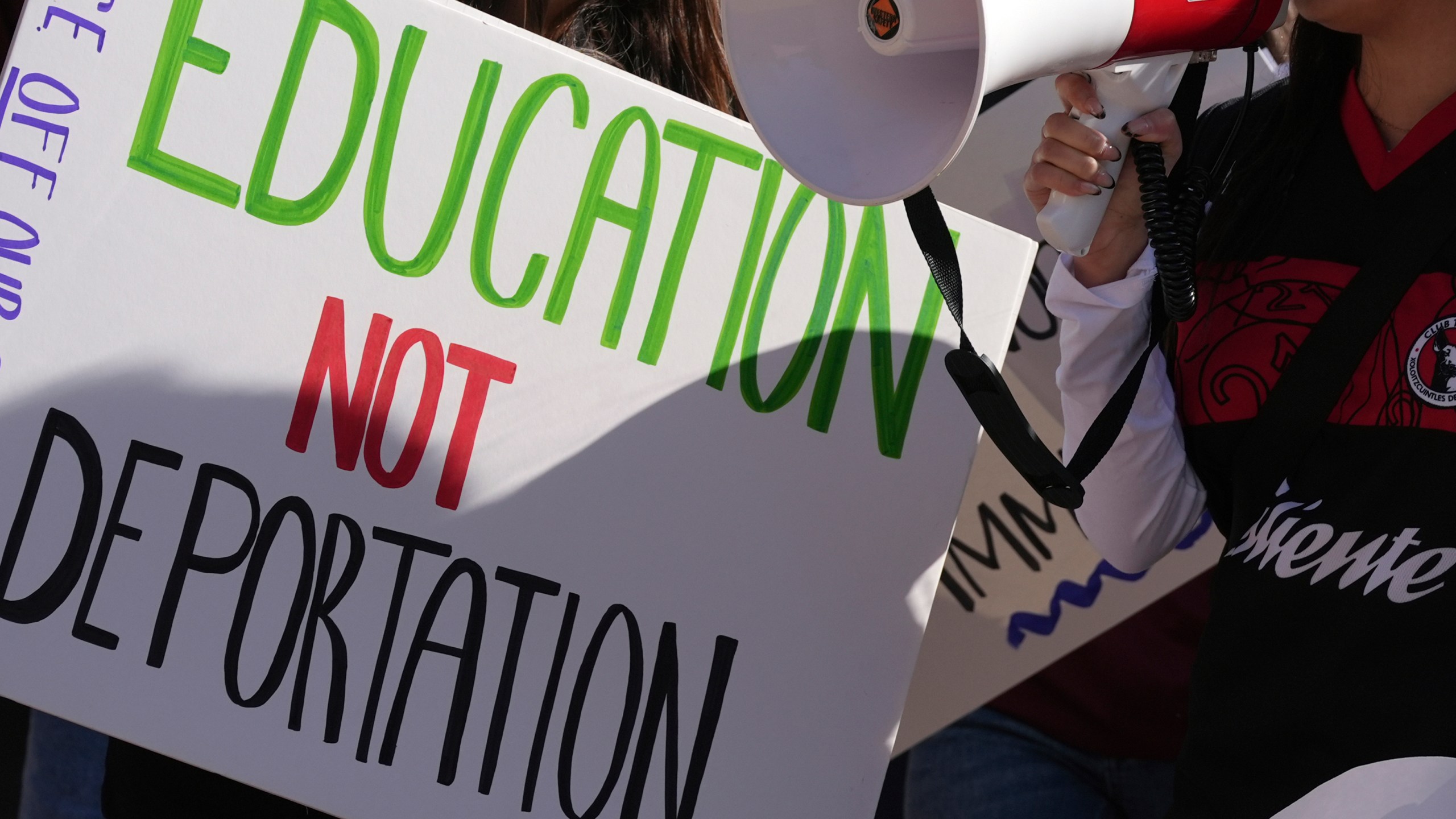 FILE - Students march at Arizona State University in protest of ASU's chapter of College Republicans United-led event encouraging students to report "their criminal classmates to ICE for deportations", Jan. 31, 2025, in Tempe, Ariz. (AP Photo/Ross D. Franklin, File)