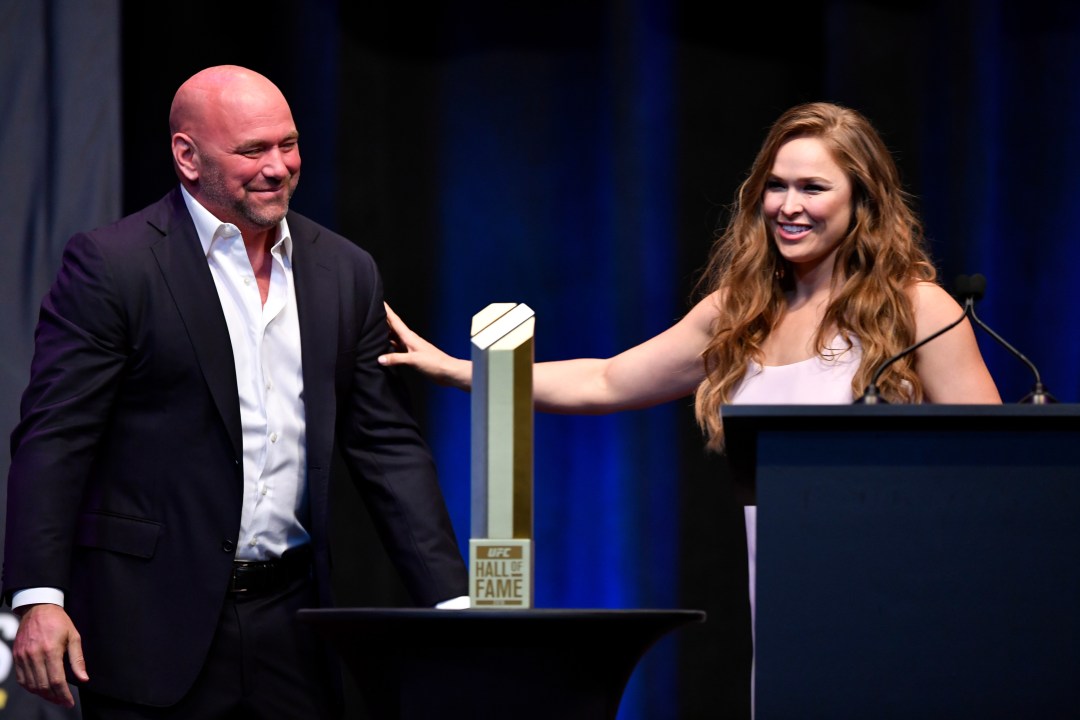 Former UFC bantamweight champion Ronda Rousey is inducted into the UFC Hall of Fame by UFC president