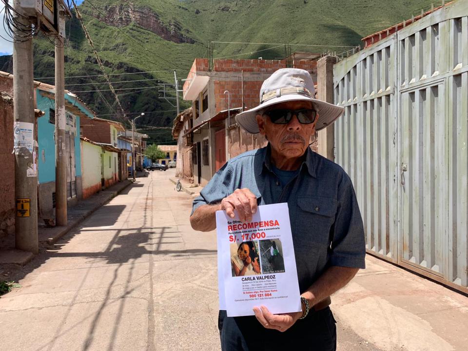 Carlos Valpeoz with flyer