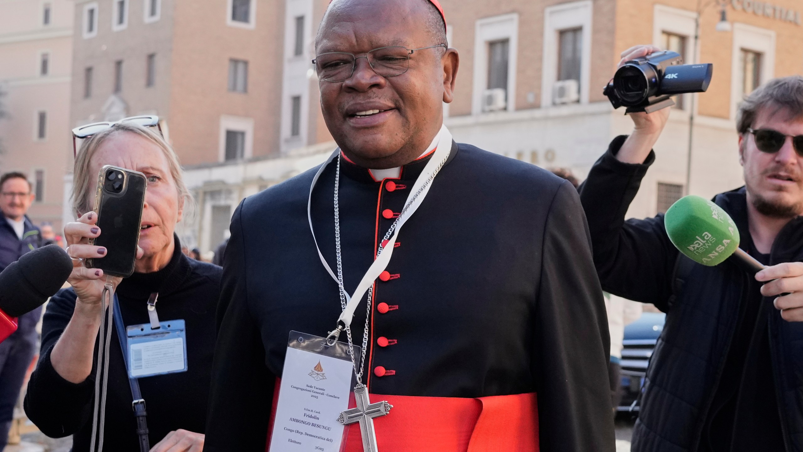 FILE - Cardinal Fridolin Ambongo Besungu arrives for a college of cardinals' meeting, at the Vatican, Wednesday, April 30, 2025. (AP Photo/Gregorio Borgia, File)