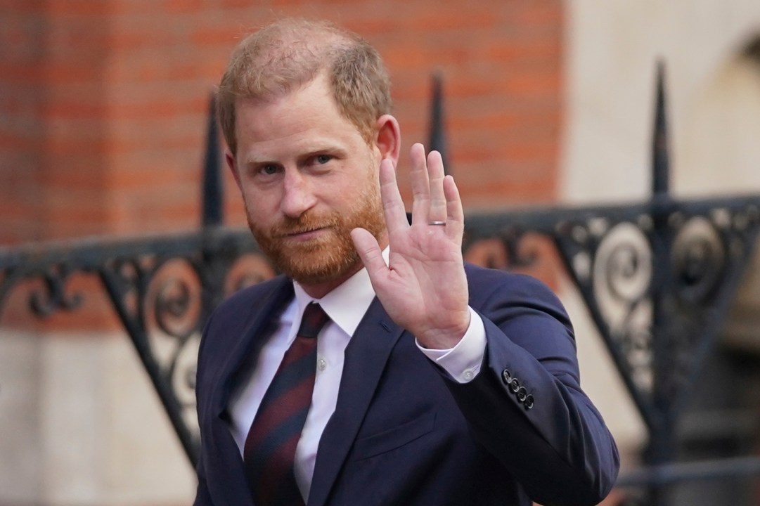 Prince Harry waves as he leaves the Royal Courts of Justice in London, Wednesday, April 9, 2025. (AP Photo/Alberto Pezzali)