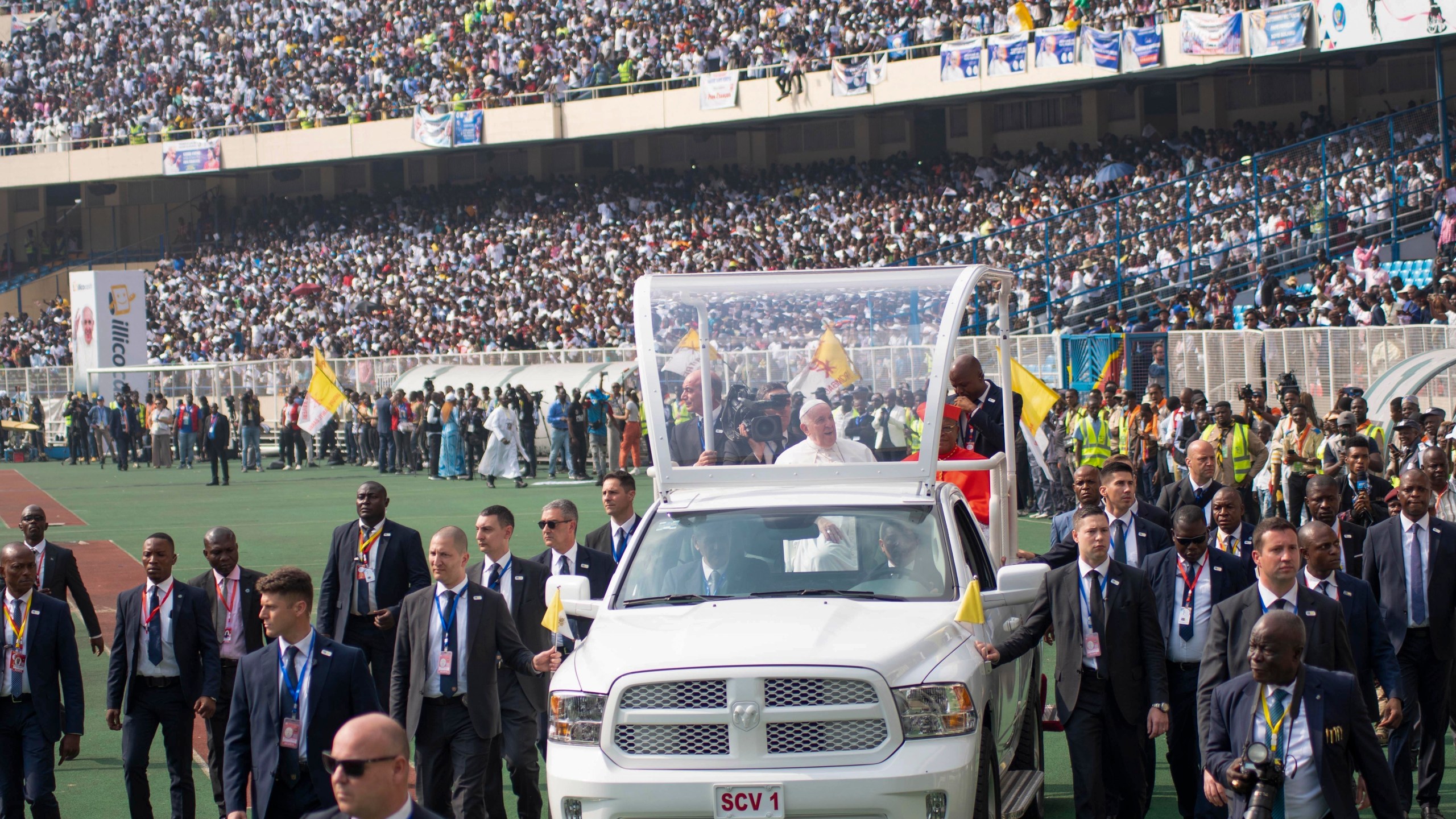 FILE - Pope Francis on the popemobile, waves at worshipers at the Martyrs' Stadium in Kinshasa, Congo, on Feb. 2, 2023. (AP Photo/Samy Ntumba Shambuyi, File)