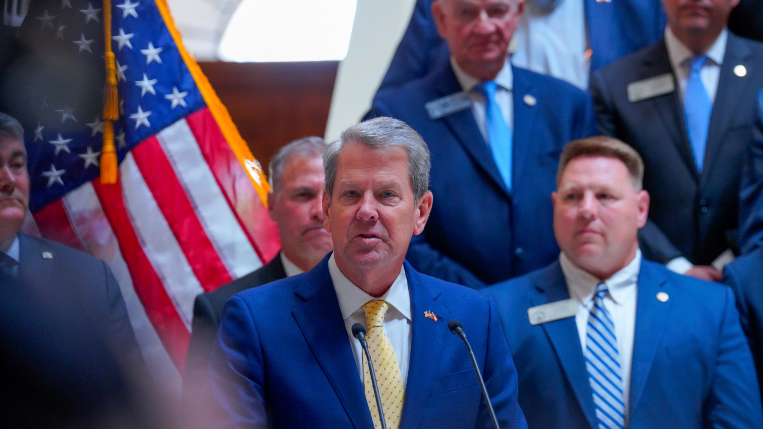 Georgia Gov. Brian Kemp signs legislation into law addressing eduction and school safety policies at the state Capitol on Monday, April 28, 2025, in Atlanta. (Matthew Pearson/WABE via AP)