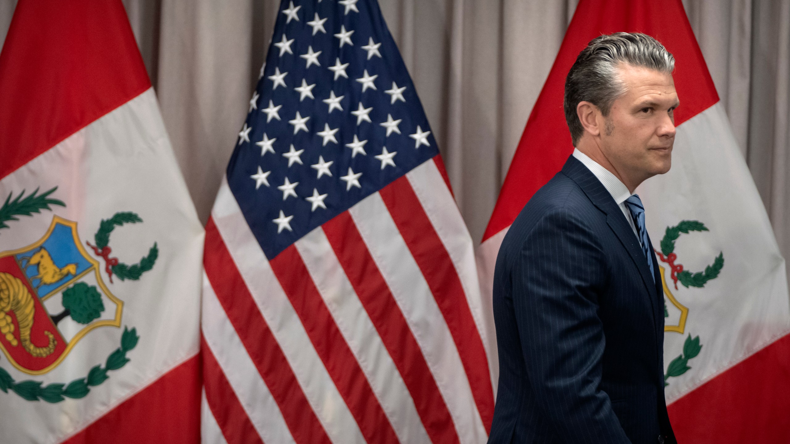 Secretary of Defense Pete Hegseth arrives for a meeting with Peru's Foreign Affairs Minister Elmer Schialer and Peru's Minister of Defense Walter Astudillo at the Pentagon, Monday, May 5, 2025, in Washington. (AP Photo/Mark Schiefelbein)