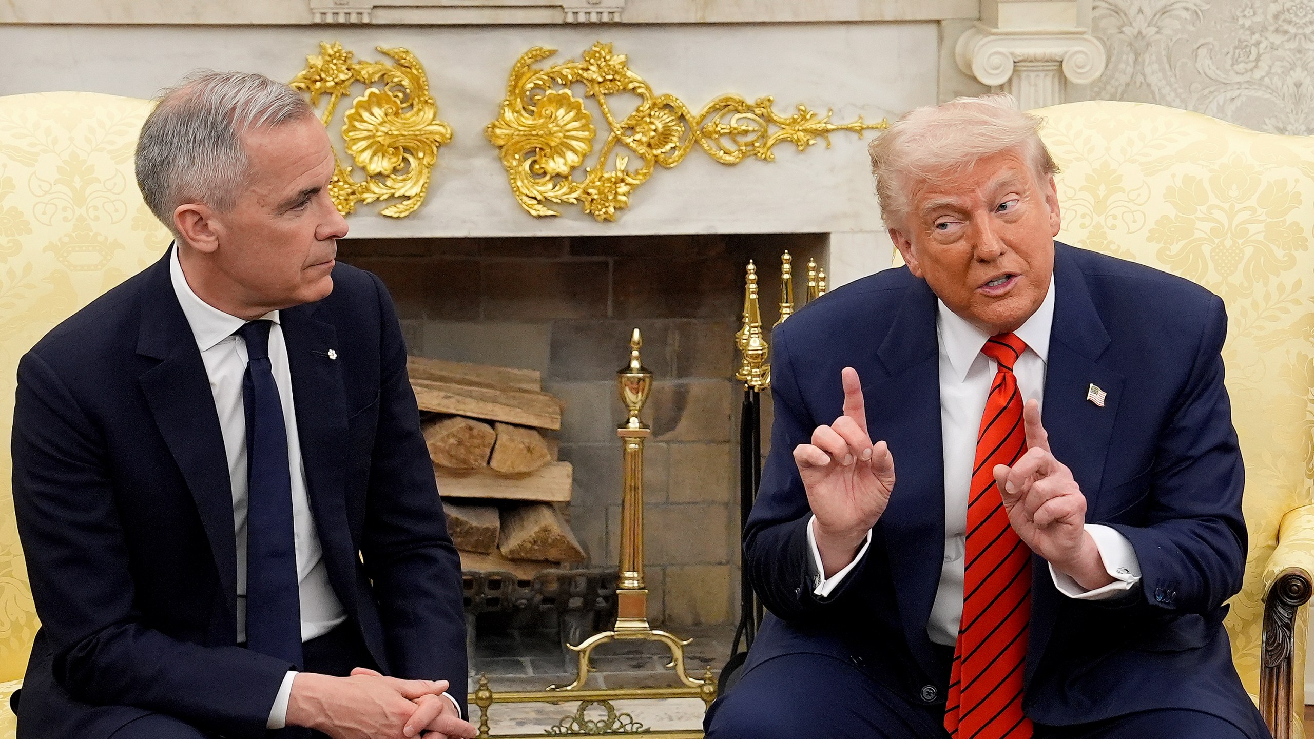 Prime Minister Mark Carney and U.S. President Donald Trump engage in a meeting at the White House in Washington, D.C., Tuesday, May 6, 2025. (Adrian Wyld /The Canadian Press via AP)