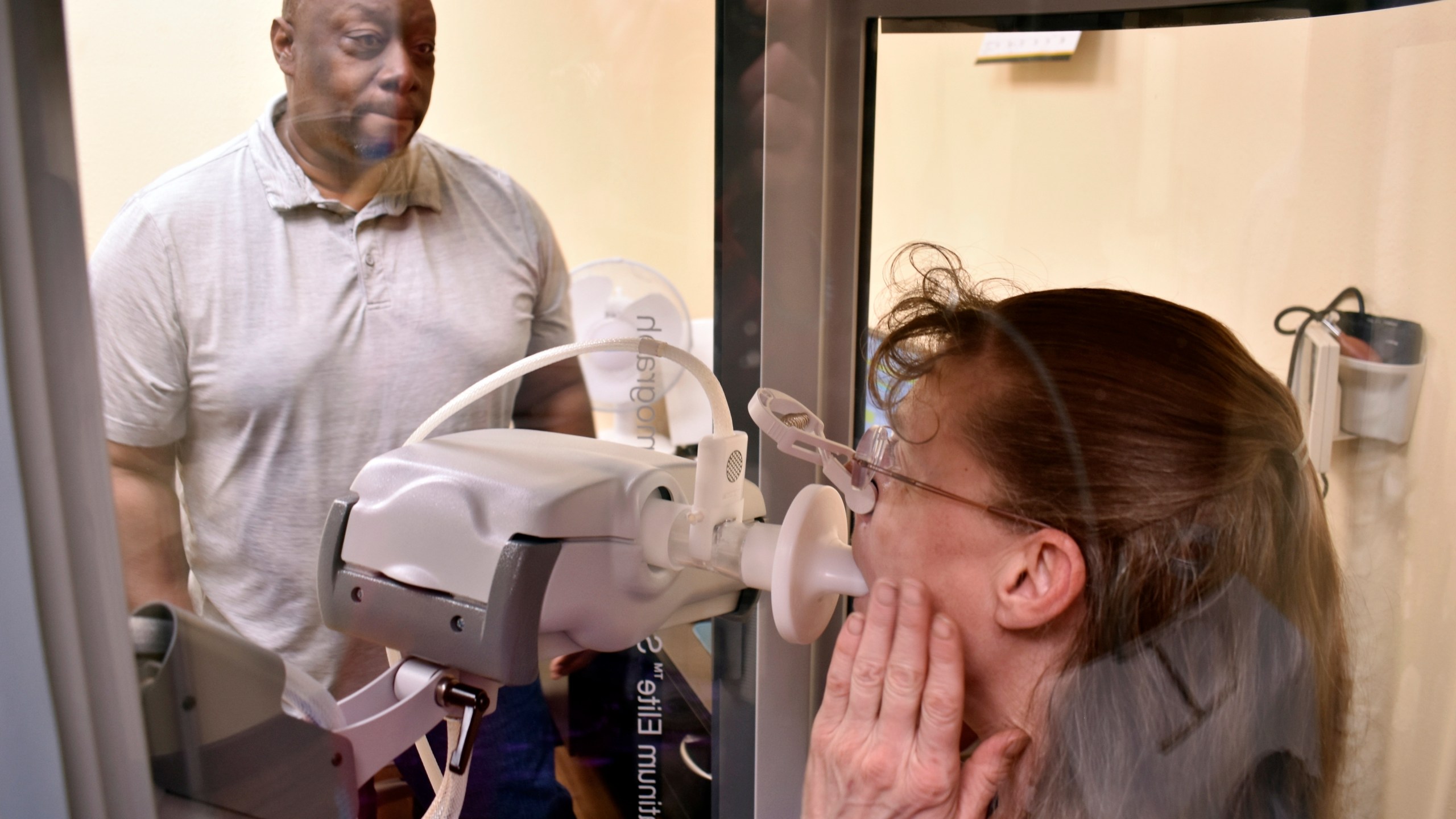FILE - Respiratory therapist Vernon Johnson, left, conducts a pulmonary test at the Center for Asbestos Related Disease, Thursday, April 4, 2024, in Libby, Mont. (AP Photo/Matthew Brown, File)