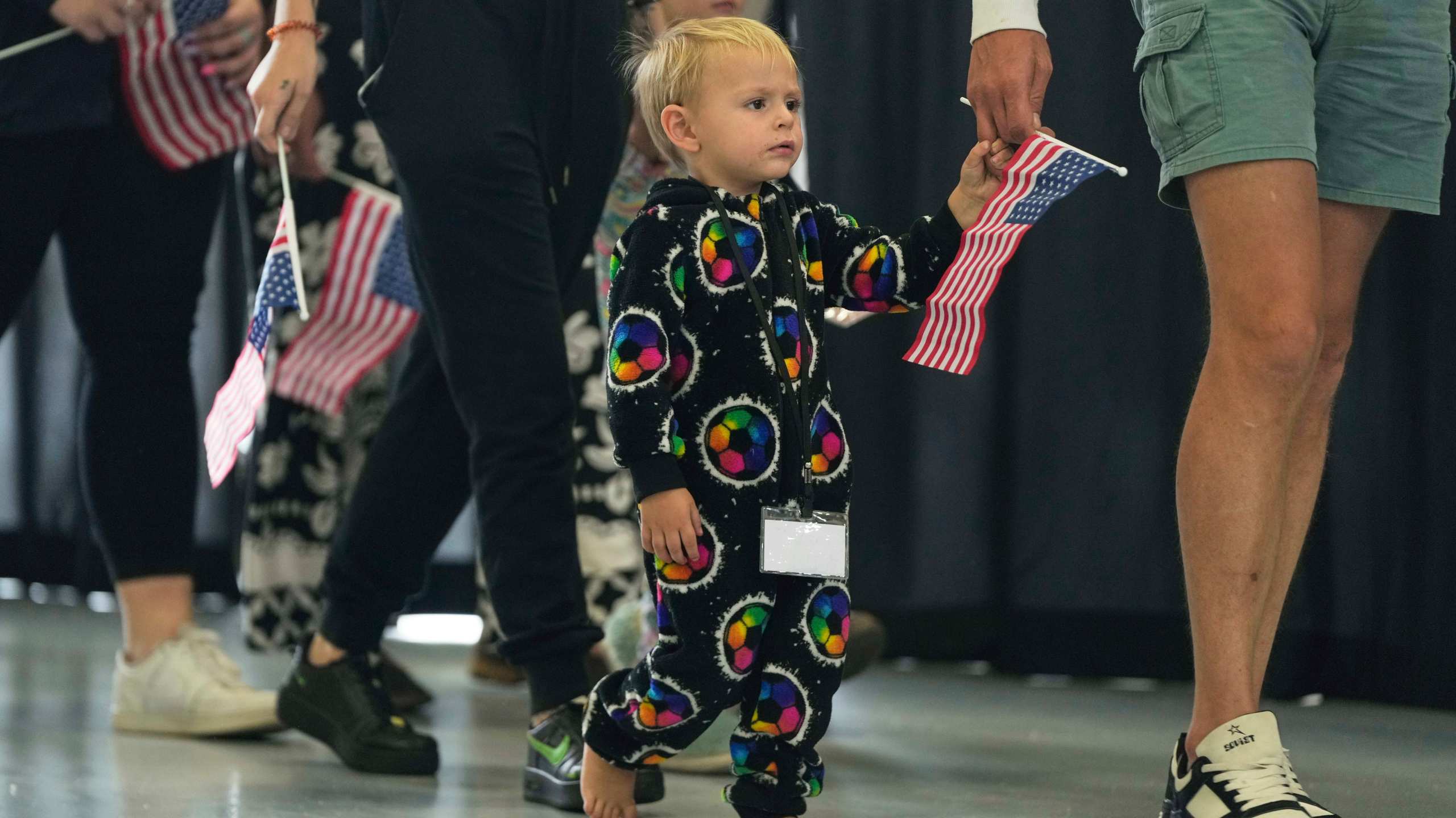 Afrikaner refugees from South Africa arrive, Monday, May 12, 2025, at Dulles International Airport in Dulles, Va. (AP Photo/Julia Demaree Nikhinson)