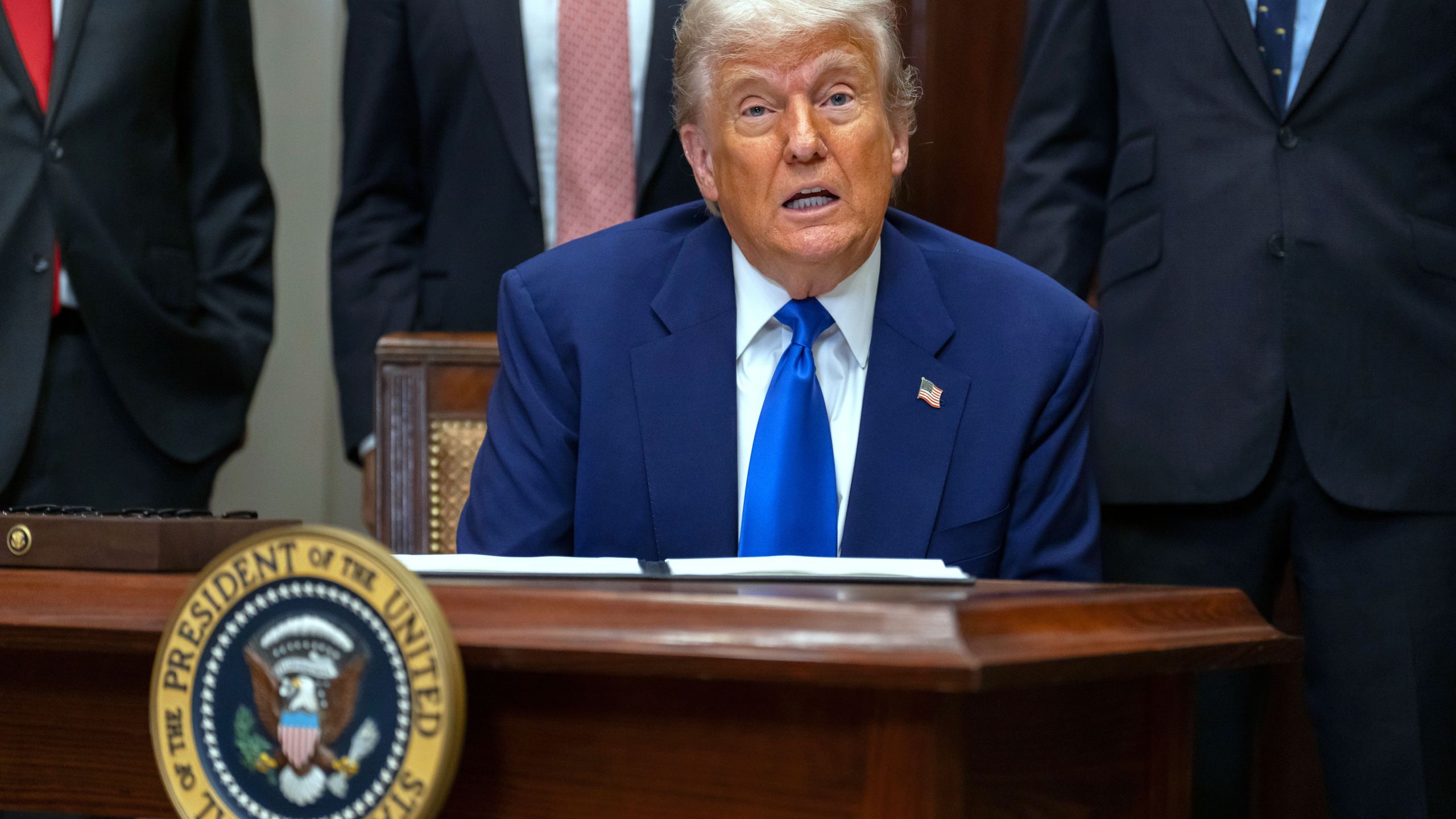 President Donald Trump answers a reporter's question during an event in the Roosevelt Room at the White House, Monday, May 12, 2025, in Washington. (AP Photo/Mark Schiefelbein)