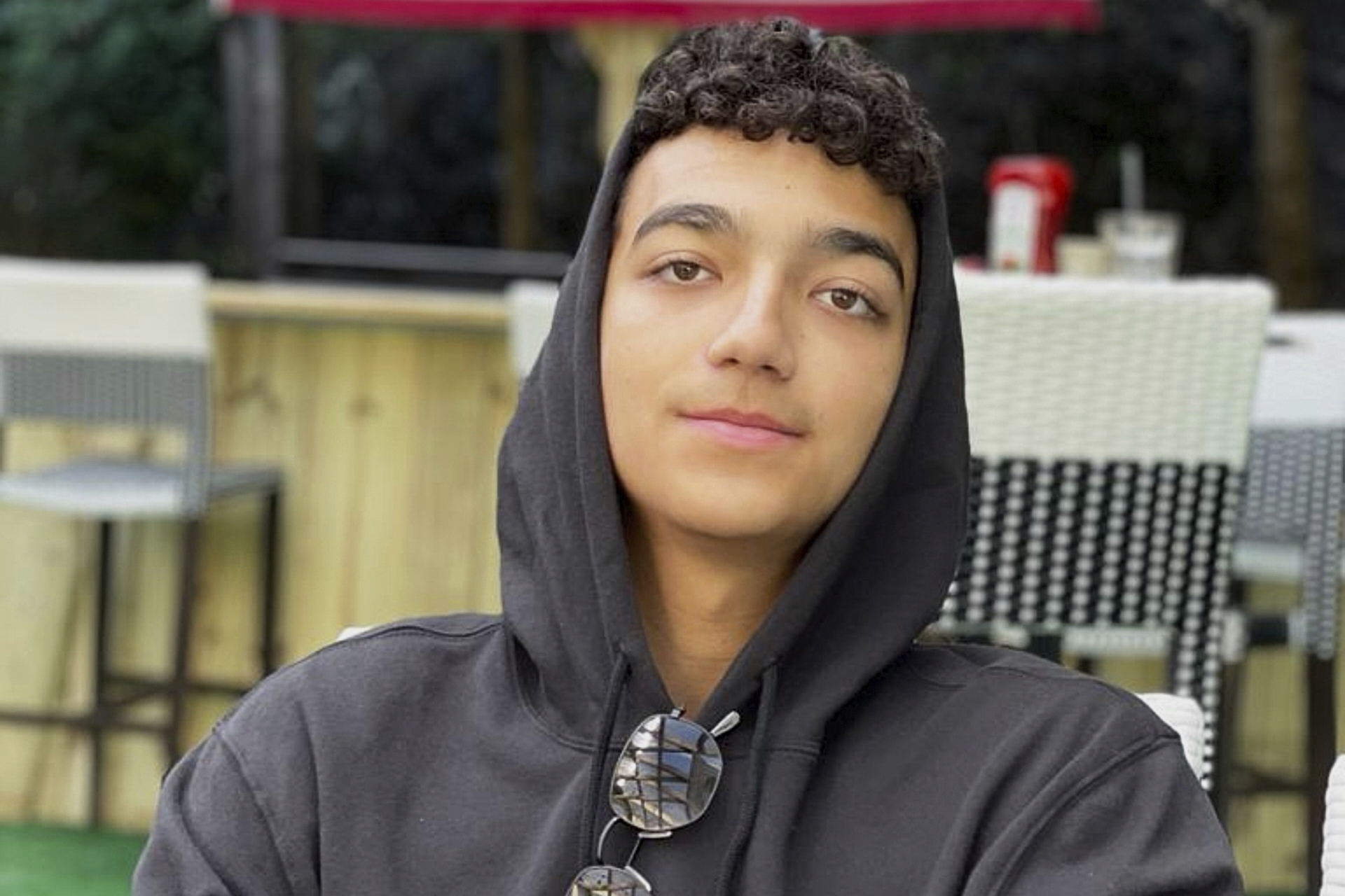 Edan Alexander smiling for a photo