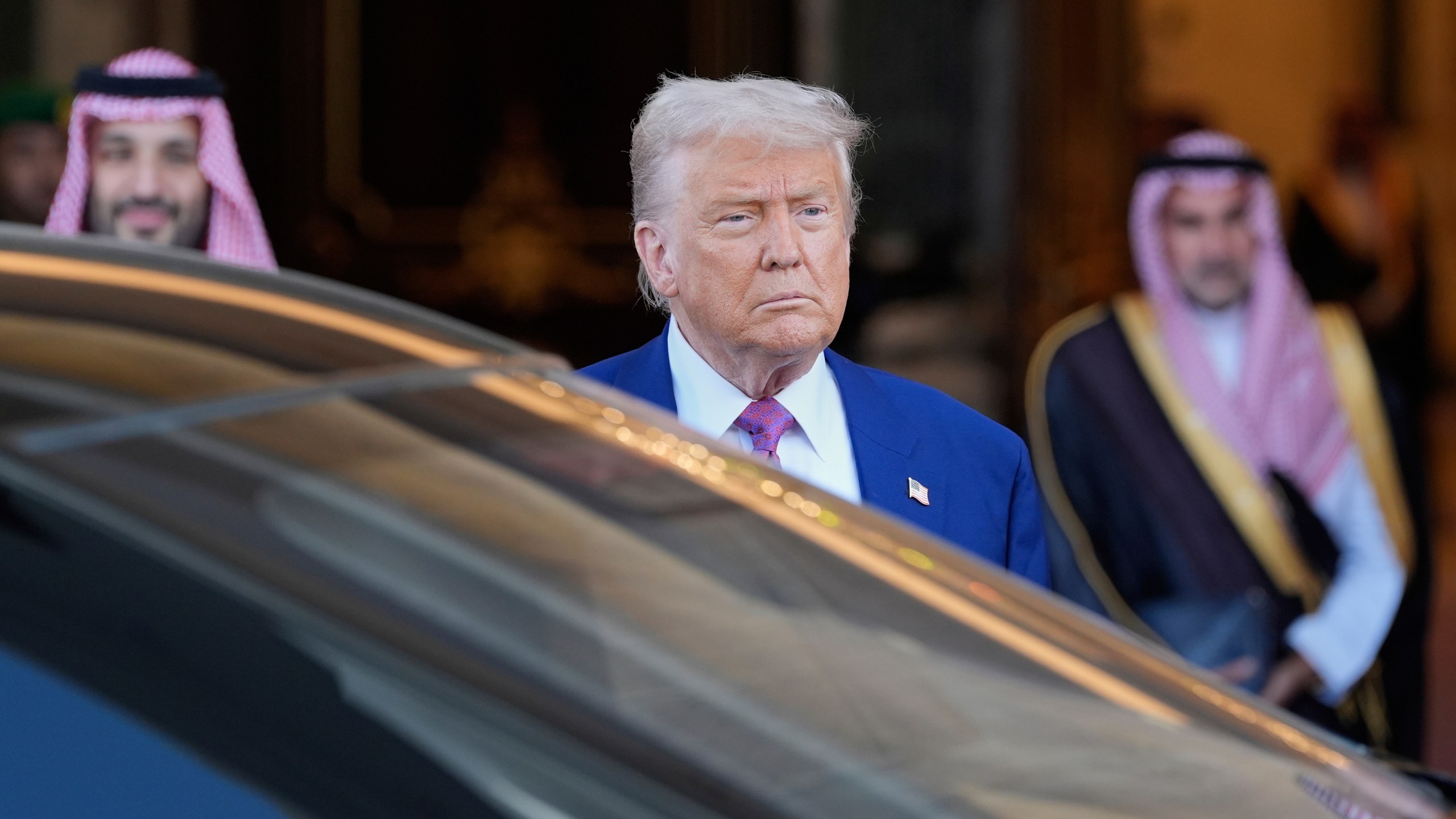 President Donald Trump looks on as he leaves the Royal Palace after a signing ceremony with Saudi Crown Prince Mohammed bin Salman in Riyadh, Saudi Arabia, Tuesday, May 13, 2025. (AP Photo/Alex Brandon)