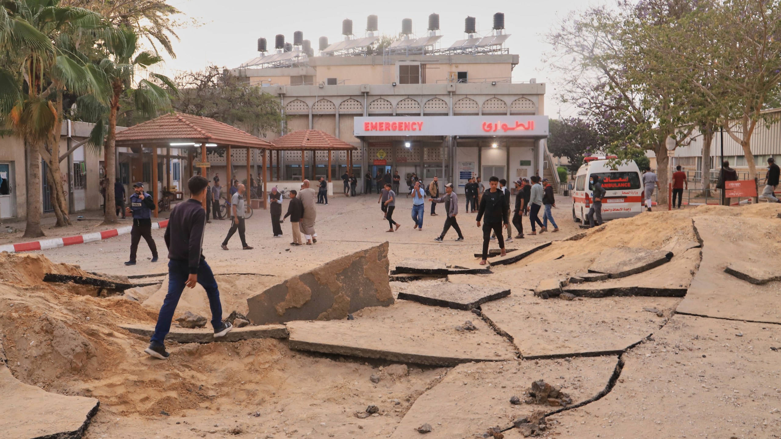 Palestinians inspect the site of an Israeli army airstrike on the European hospital in Khan Younis, Gaza Strip, Tuesday, May 13, 2025. The Israeli military said it had carried out a strike targeting what it said was a Hamas "command and control center" located beneath the hospital. (AP Photo/Mariam Dagga)