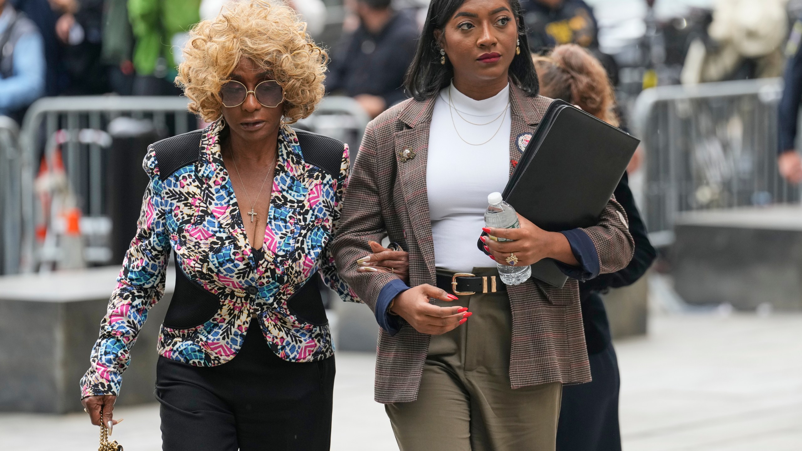 Janice Combs, mother of Sean Diddy Combs, left, arrives at Manhattan federal court, Tuesday, May 13, 2025, in New York. (AP Photo/Seth Wenig)