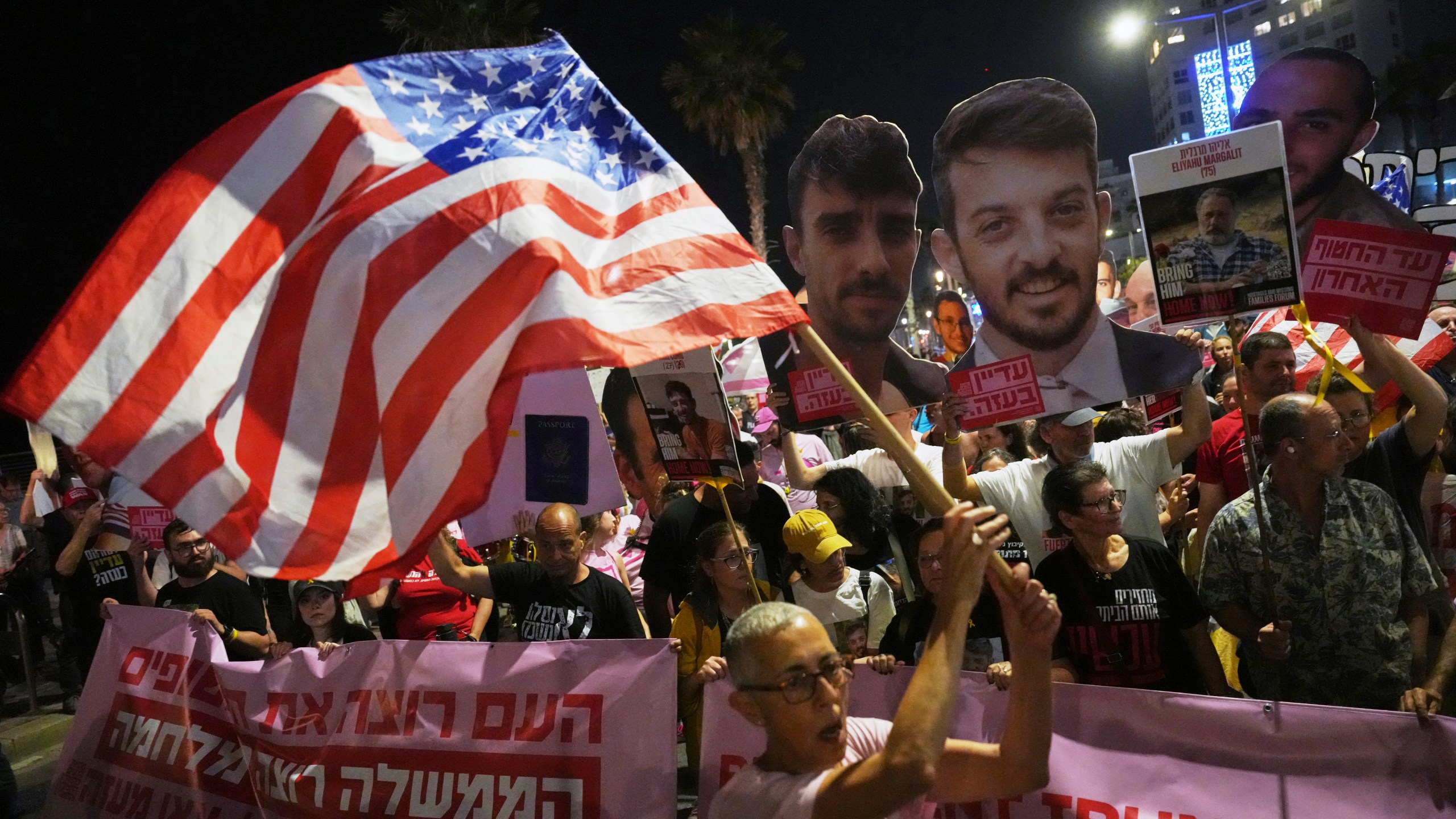 Israelis protest outside the U.S. Embassy Branch Office in Tel Aviv on Tuesday, May 13, 2025, demanding the release of hostages held by Hamas in the Gaza Strip. (AP Photo/Ariel Schalit)