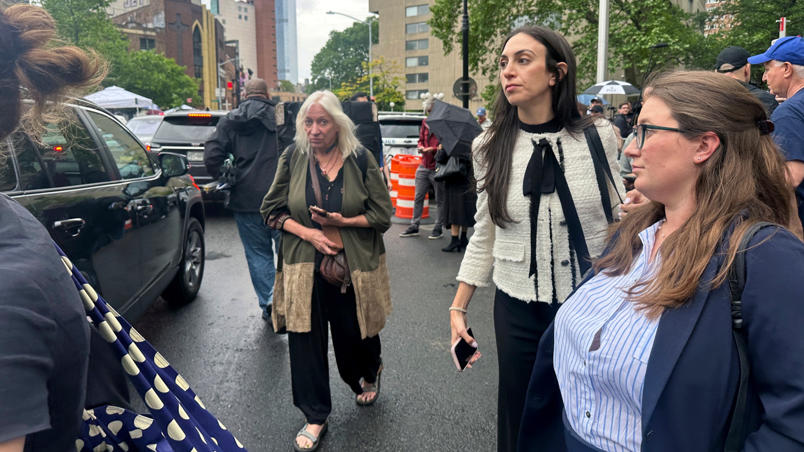 Defense attorney Teny Geragos, center, exits court during the Sean "Diddy" Combs' sex trafficking trial, Tuesday, May 13, 2025. (AP Photo/Ted Shaffrey)