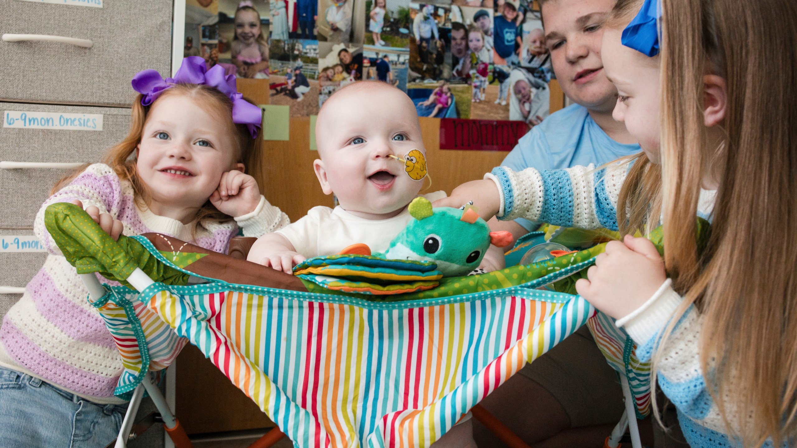 In this photo provided by the Children's Hospital of Philadelphia, KJ Muldoon, center, sits with his siblings after a follow up dose of an experimental gene editing treatment at the hospital in April 2025. (Chloe Dawson/Children's Hospital of Philadelphia via AP)