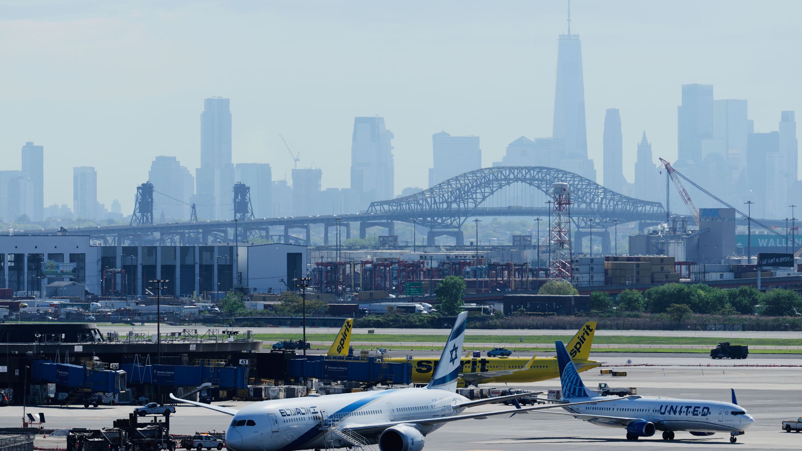 The New York City skyline is seen behind Newark Liberty International Airport in Newark, N.J., Wednesday, May 7, 2025. (AP Photo/Seth Wenig)