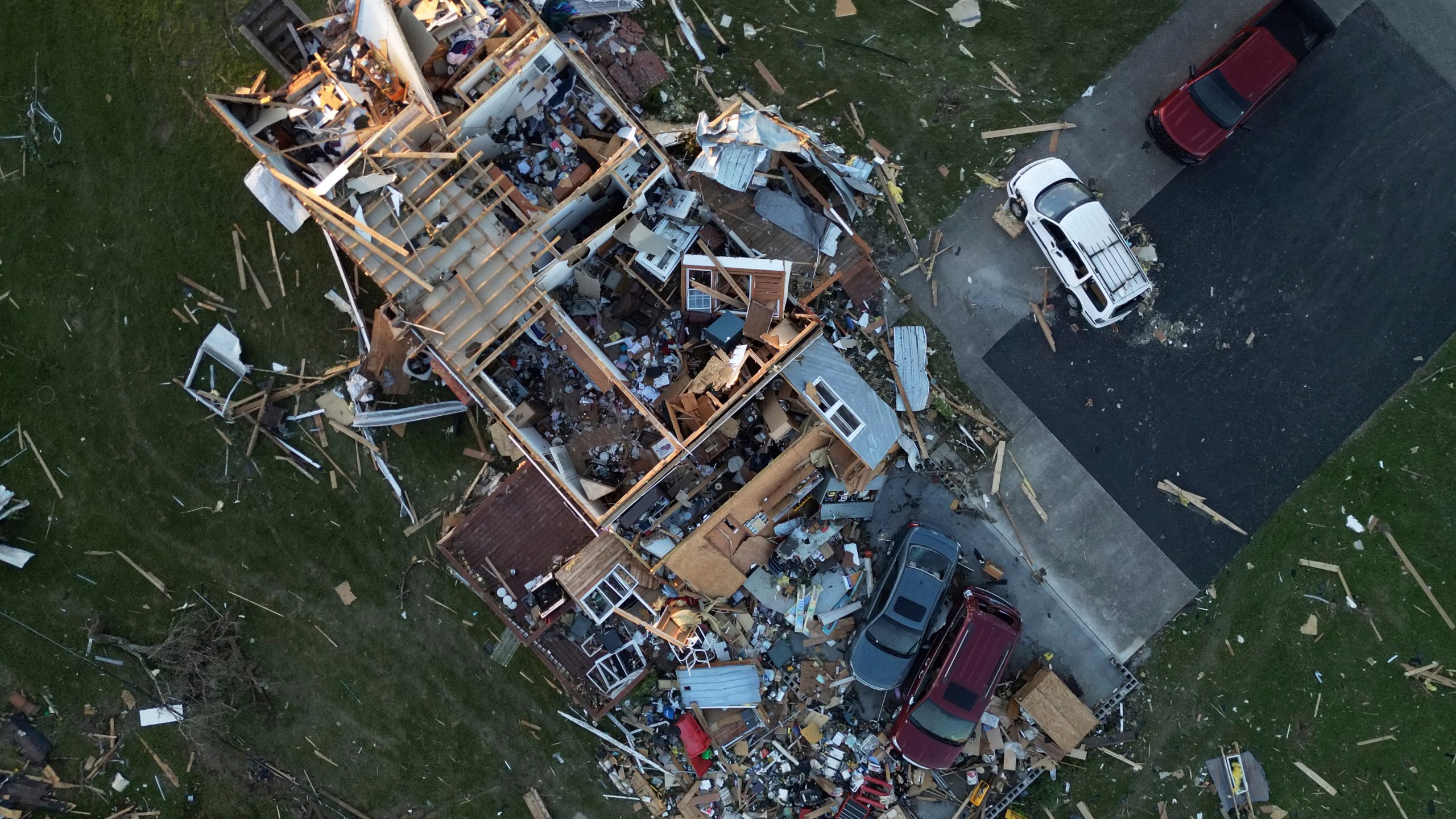 A home is destroyed after a severe storm passed through the area, Saturday, May 17, 2025, in London, Ky. (AP Photo/Carolyn Kaster)