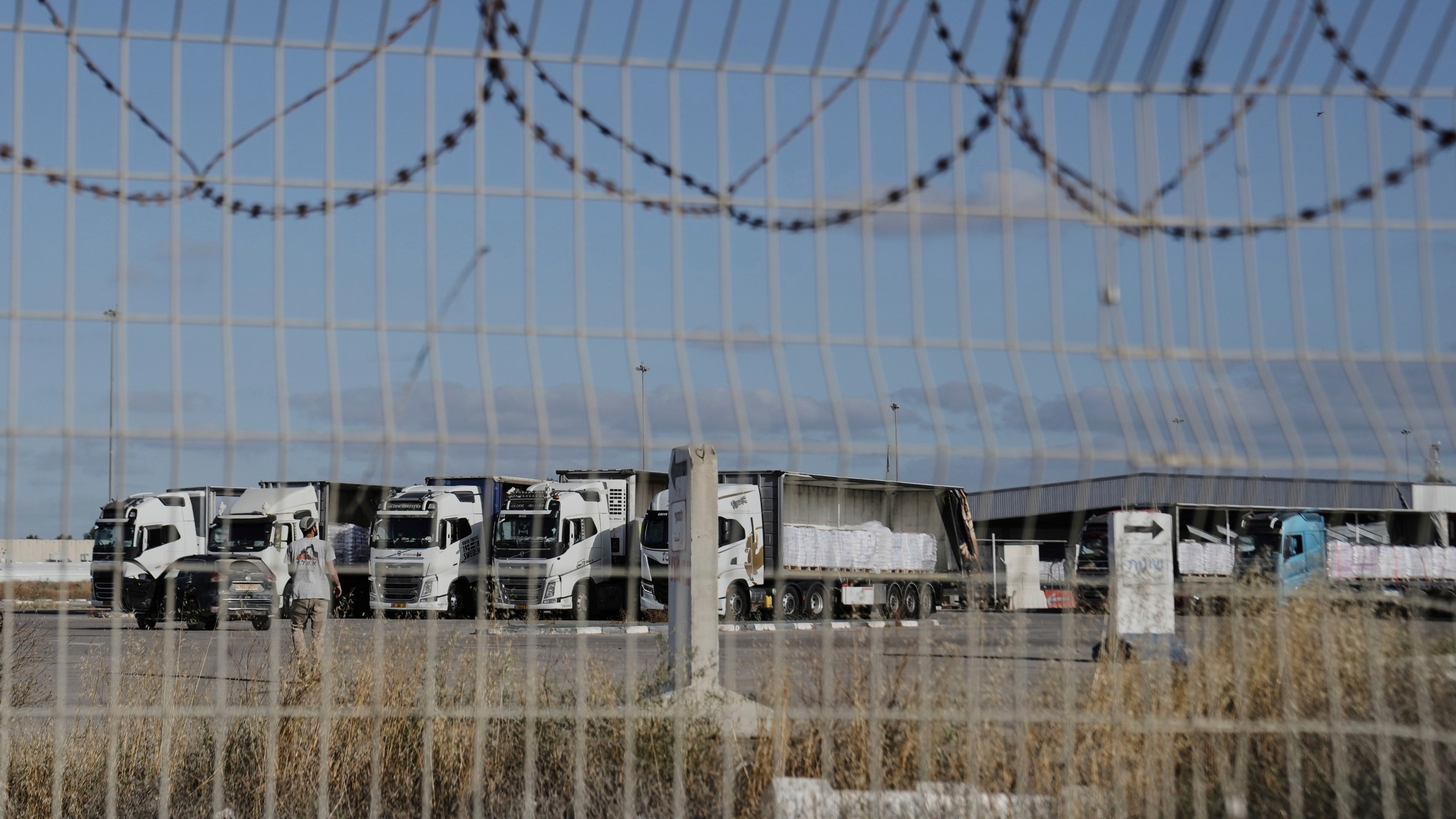 Trucks are seen at the Kerem Shalom Crossing in southern Israel