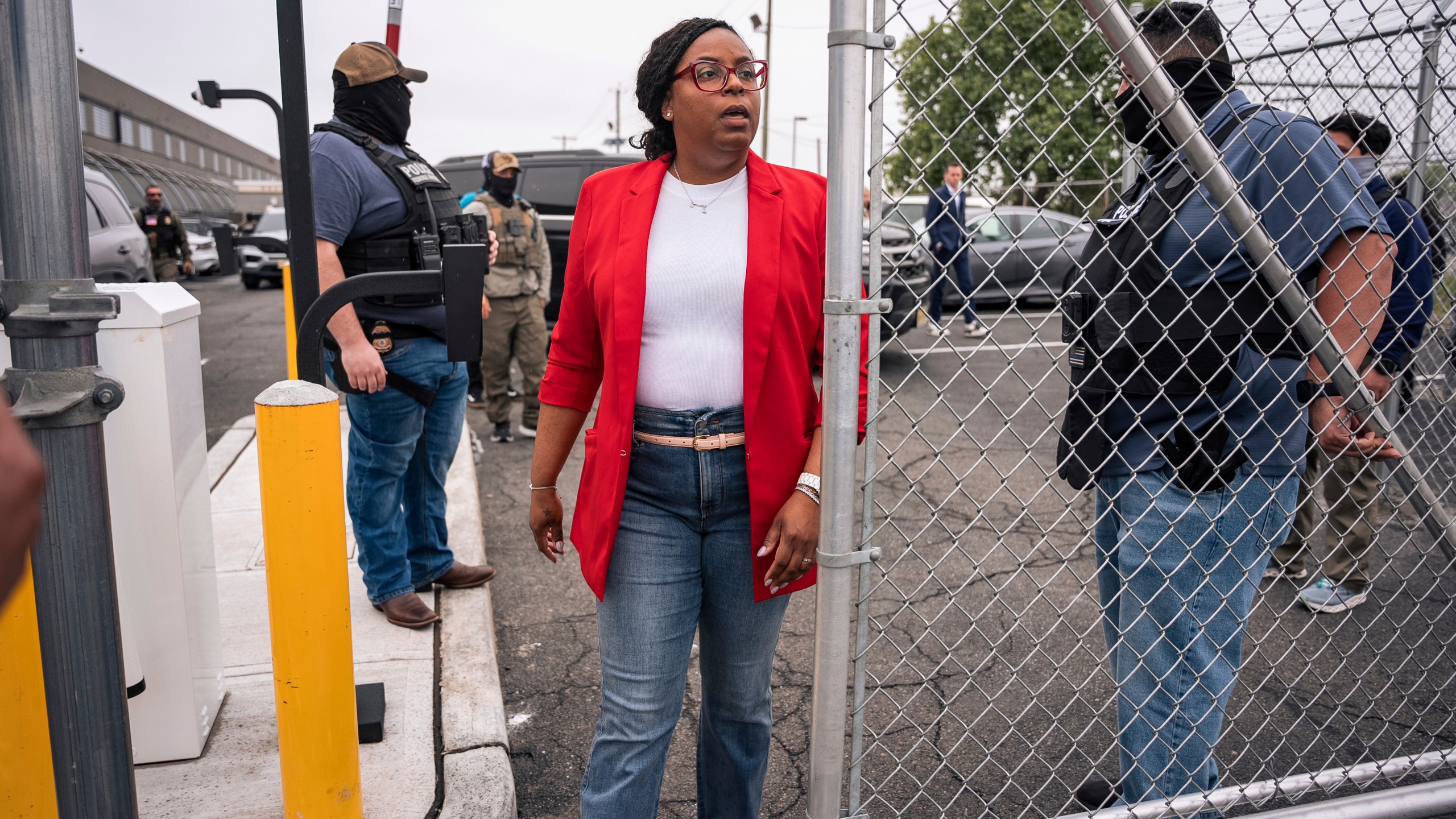 Congresswoman Rep. LaMonica McIver, D-N.J., exits the grounds at Delancey Hall ICE detention prison, Friday, May 9, 2025, in Newark, N.J, (AP Photo/Angelina Katsanis)