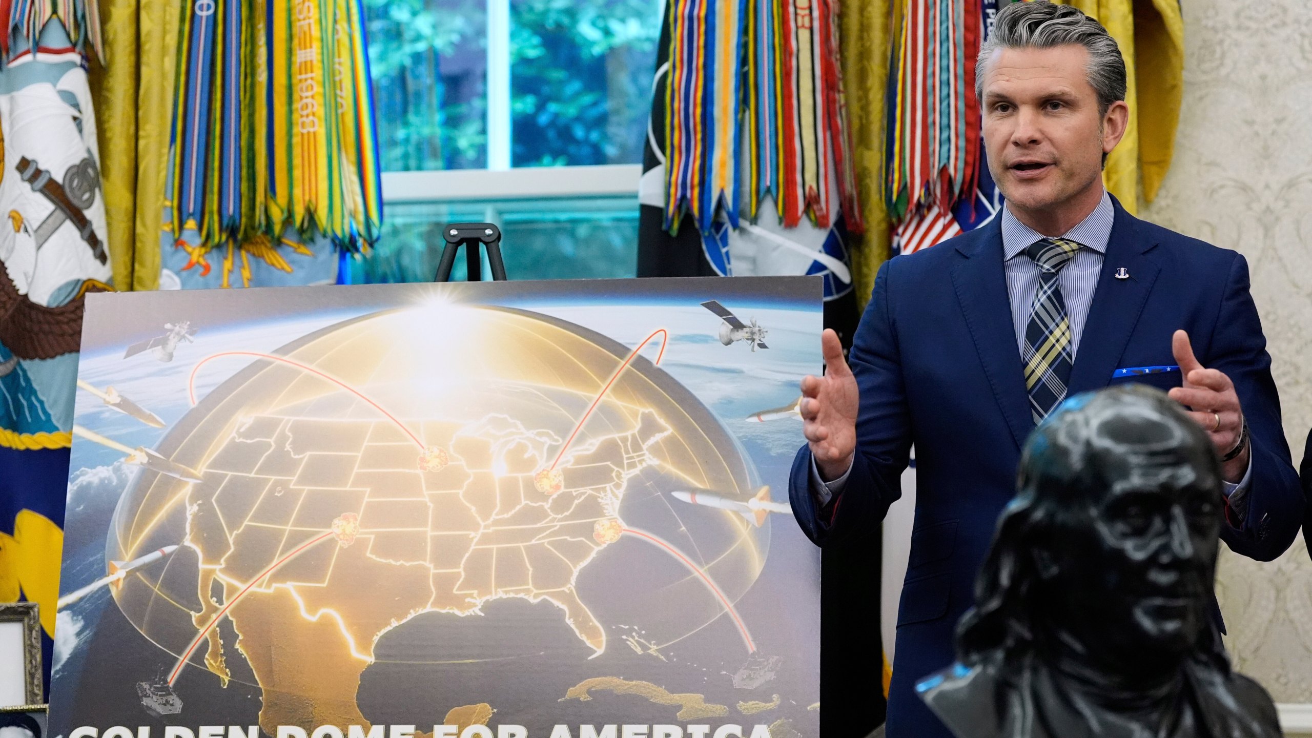 Defense Secretary Pete Hegseth speaks during an event with President Donald Trump in the Oval Office of the White House, Tuesday, May 20, 2025, in Washington. (AP Photo/Alex Brandon)