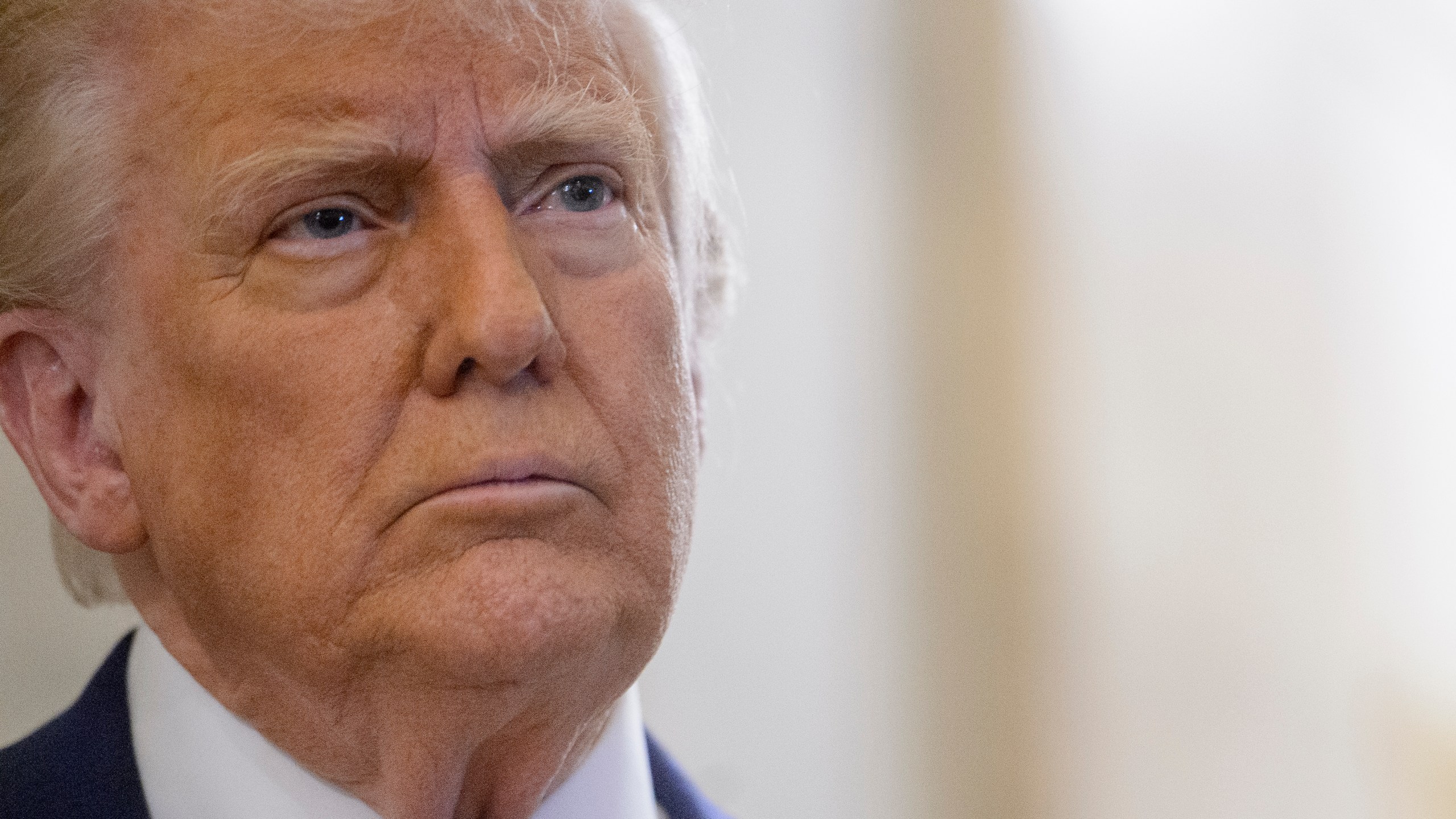 President Donald Trump speaks to reporters as he arrives for a meeting with the House Republican Conference at the Capitol, Tuesday, May 20, 2025, in Washington. (AP Photo/Rod Lamkey, Jr.)