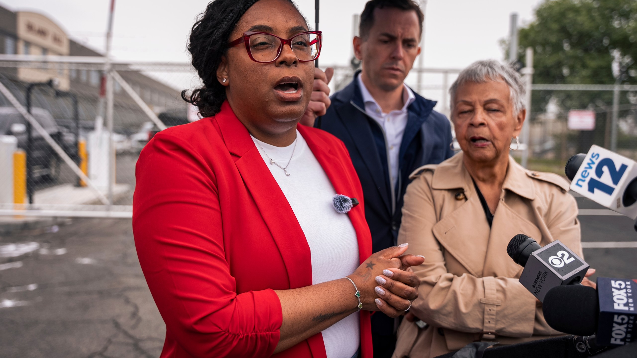 Congresswoman Rep. LaMonica McIver, D-N.J., speaks to the press after Newark mayor Ras Baraka was arrested while protesting at Delancey Hall ICE detention prison, Friday, May 9, 2025, in Newark, N.J, (AP Photo/Angelina Katsanis)